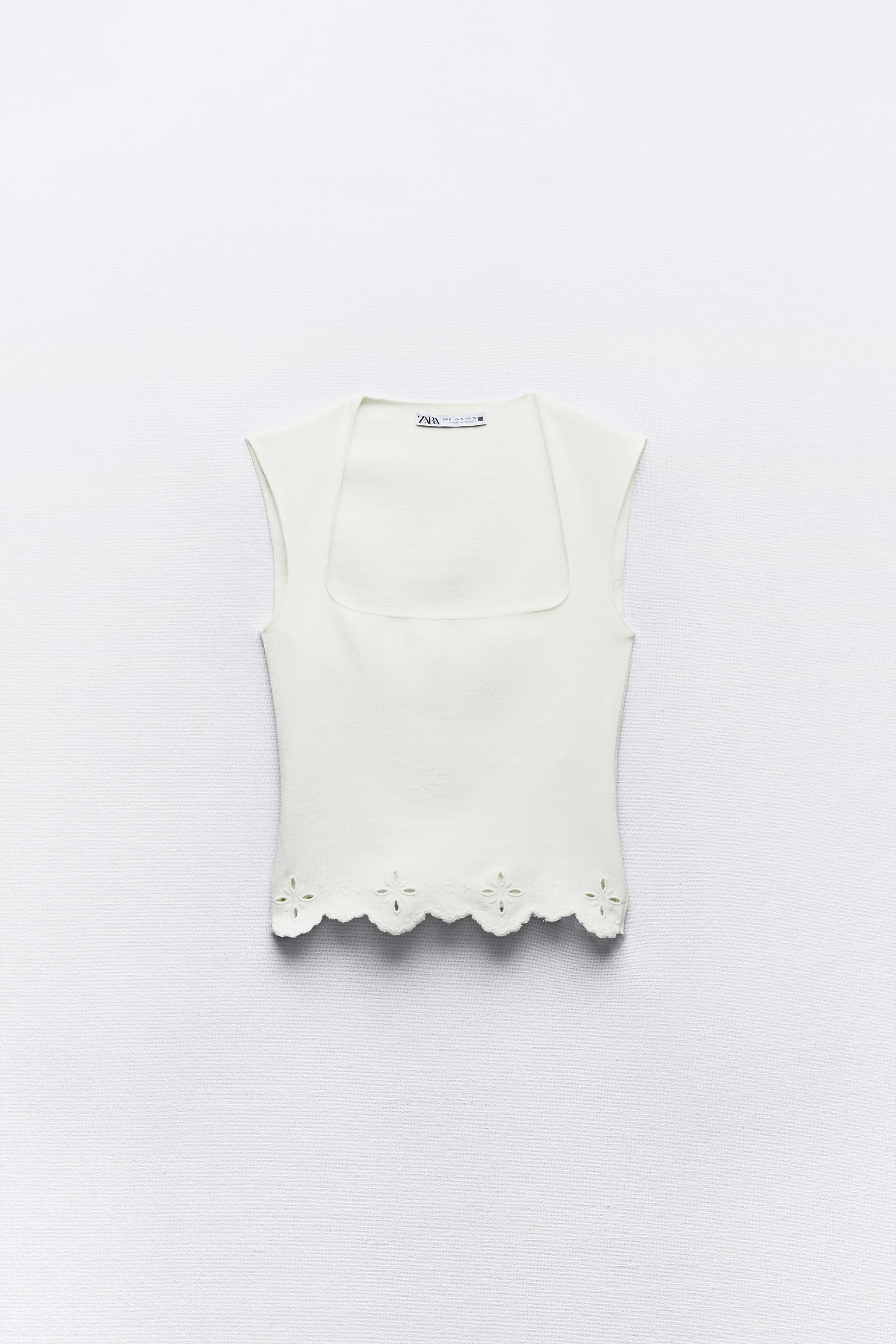 EMBROIDERED STRETCH KNIT TOP
