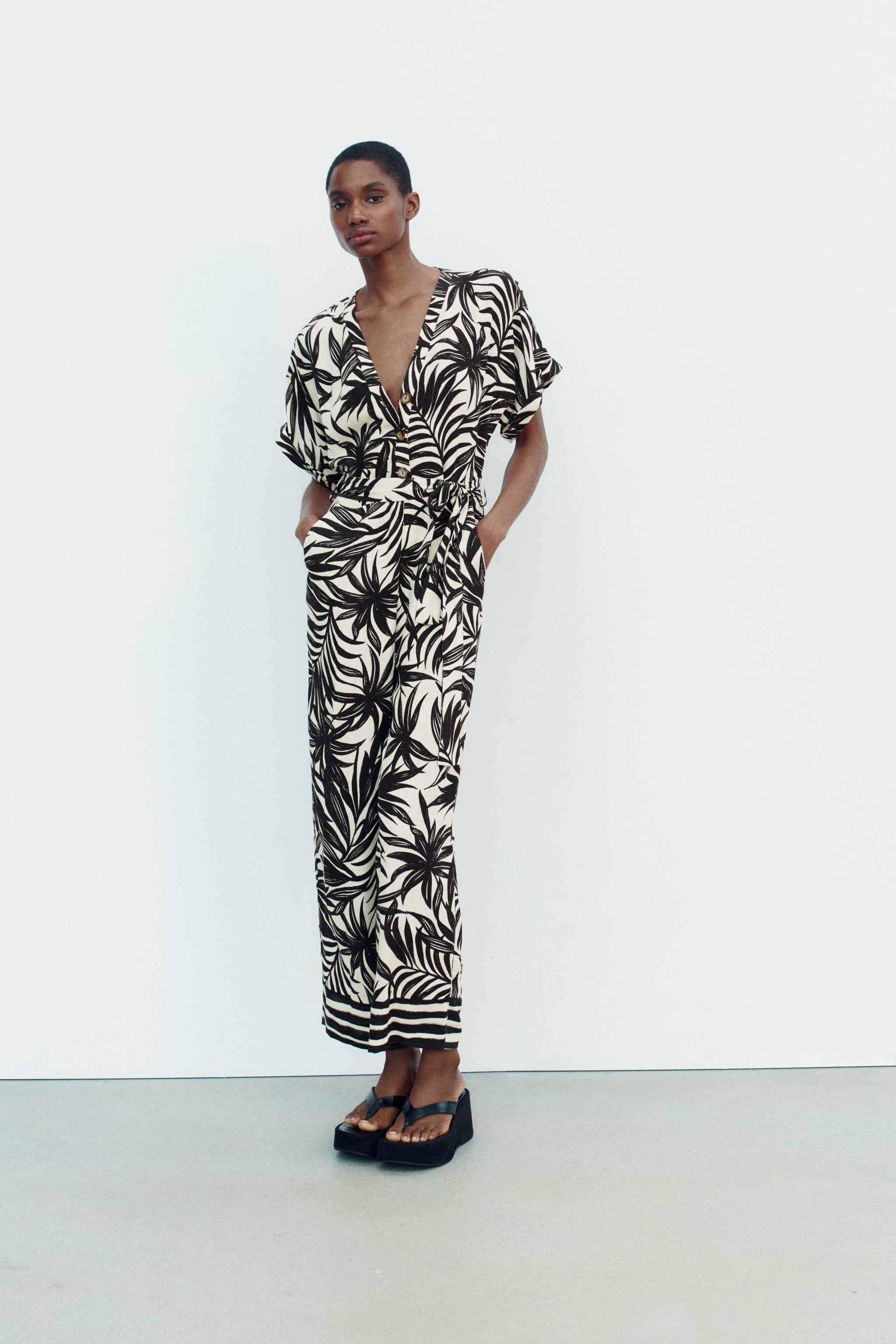 PRINTED BELTED JUMPSUIT