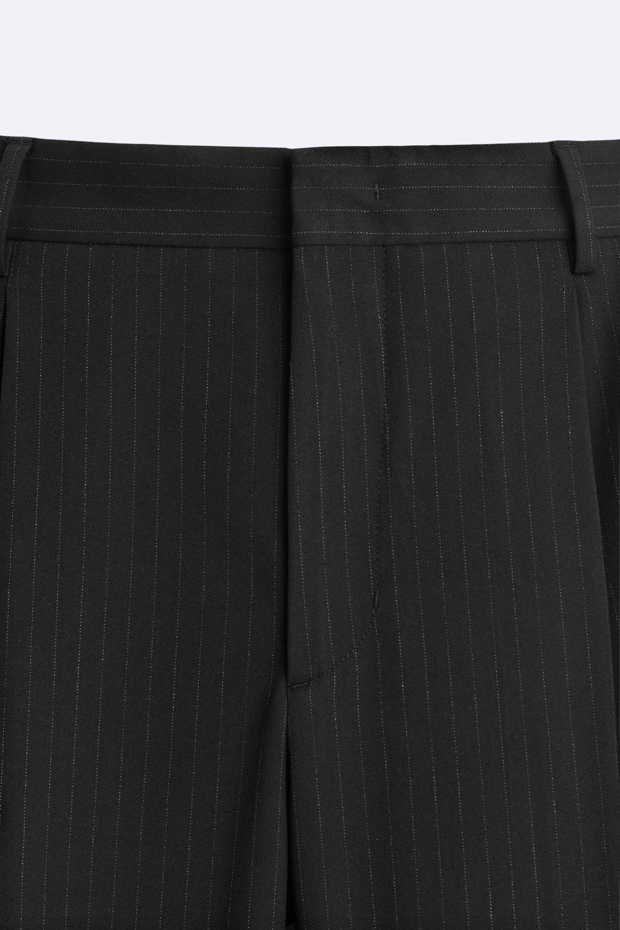 PLEATED WIDE FIT PANTS