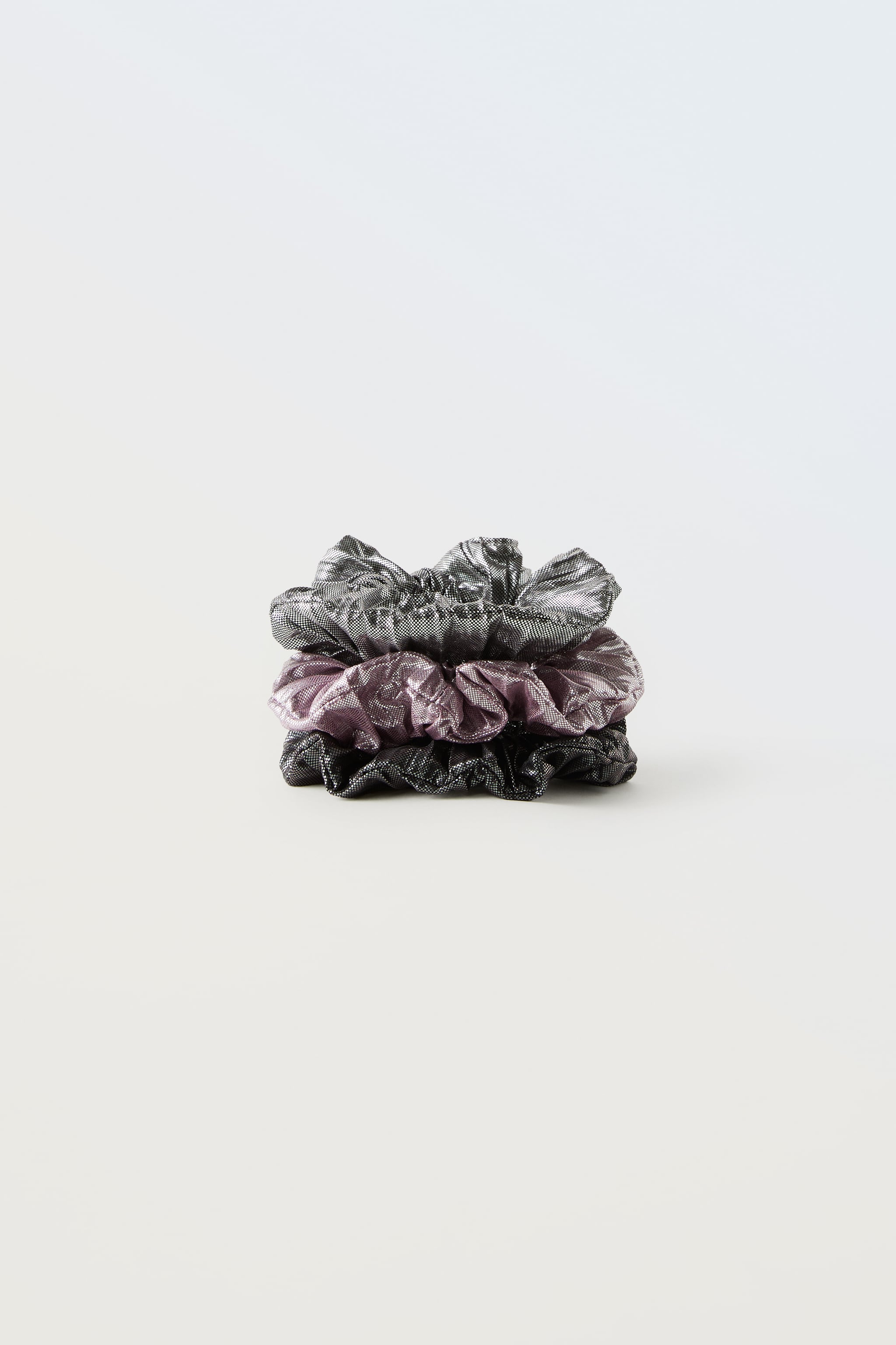THREE-PACK OF SHINY PLEATED SCRUNCHIES