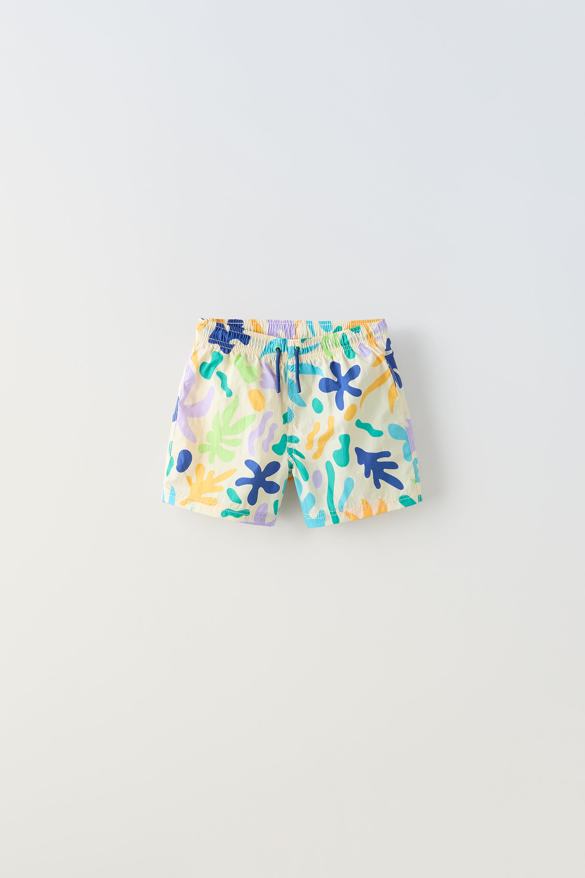 6-14 YEARS/ SUN AND LEAVES PRINT SWIMSUIT