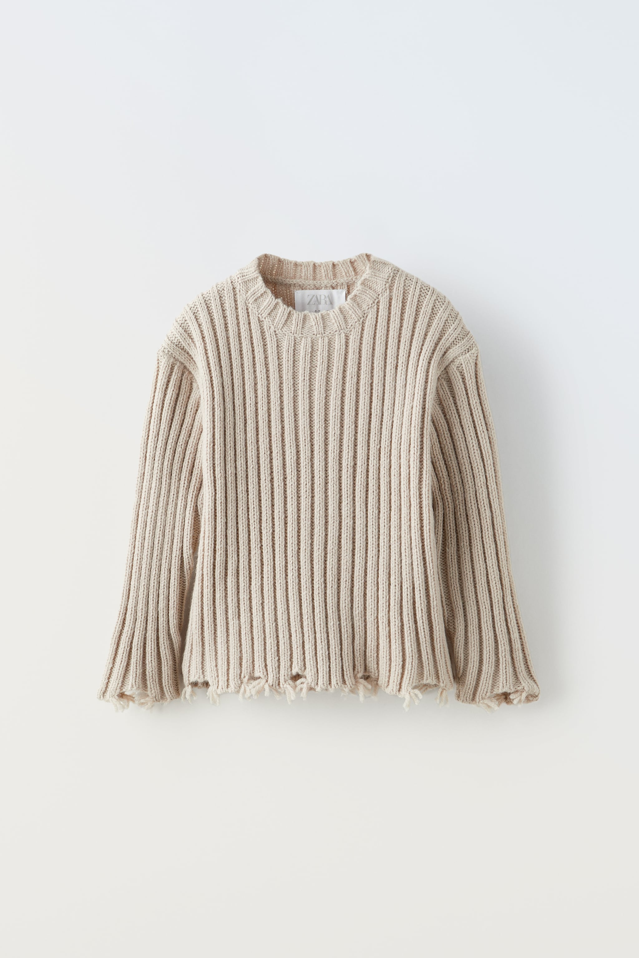 RIPPED RIBBED SWEATER