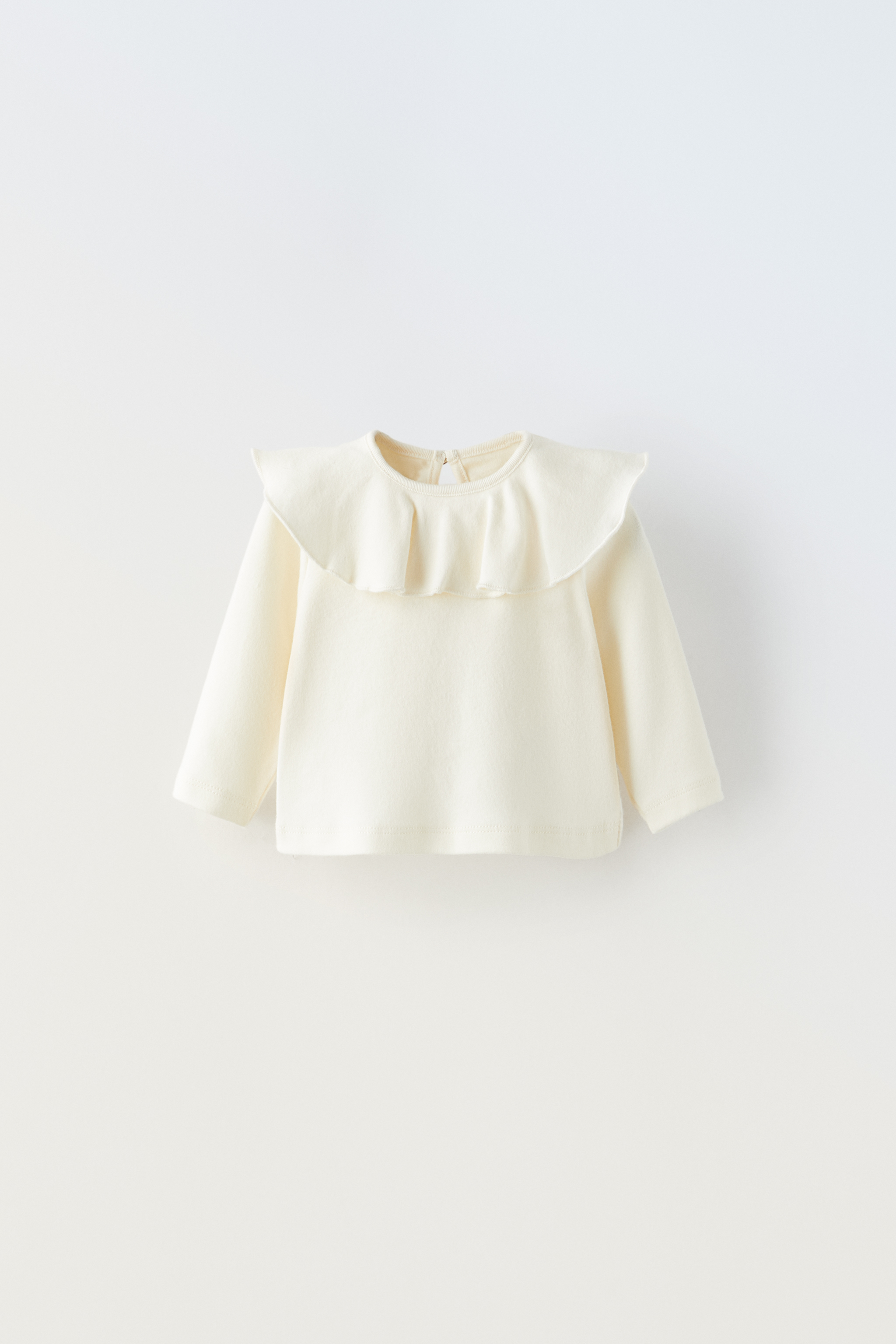 SOFT TOUCH RUFFLED COLLAR TOP