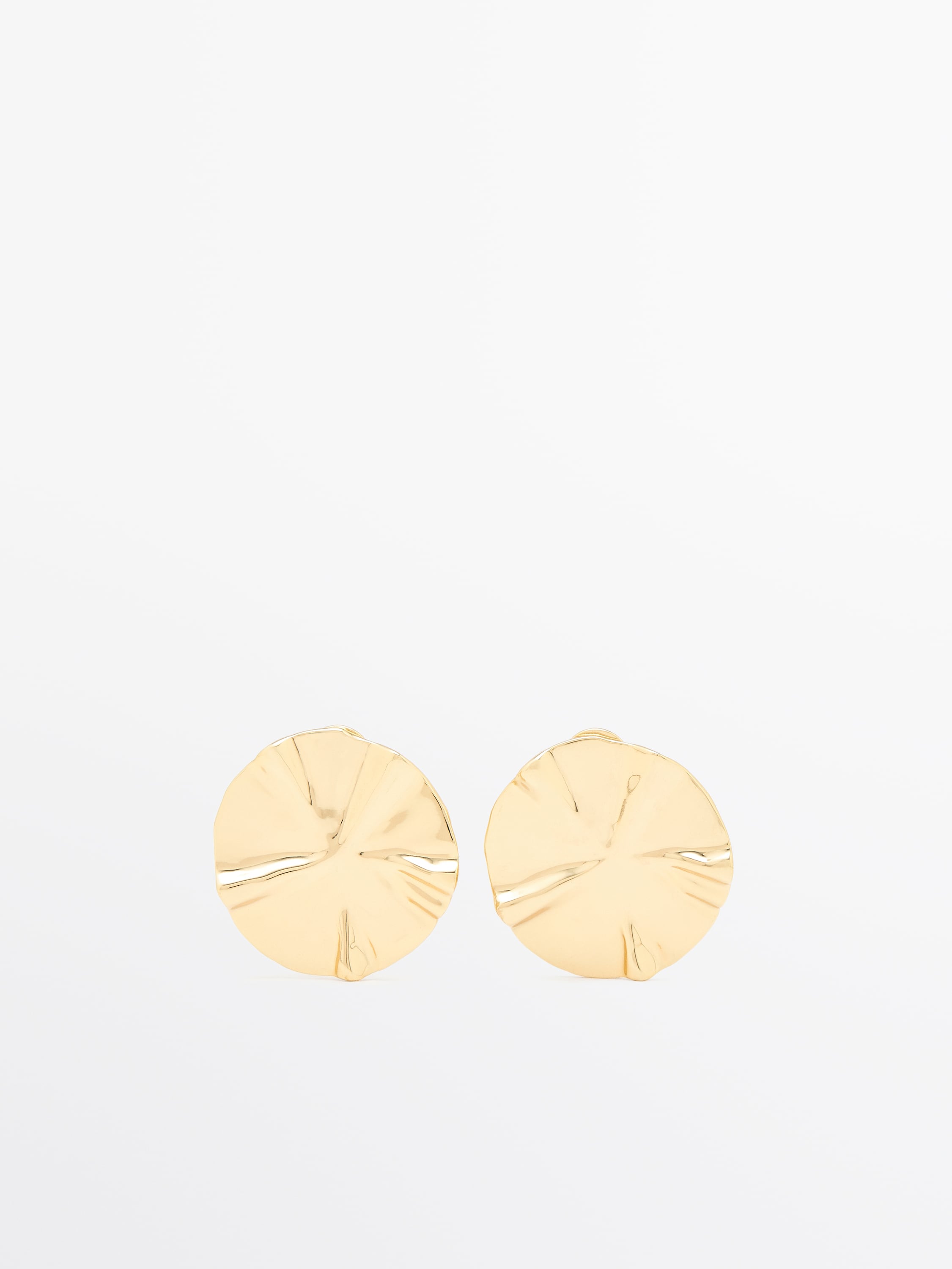 Earrings with textured piece detail