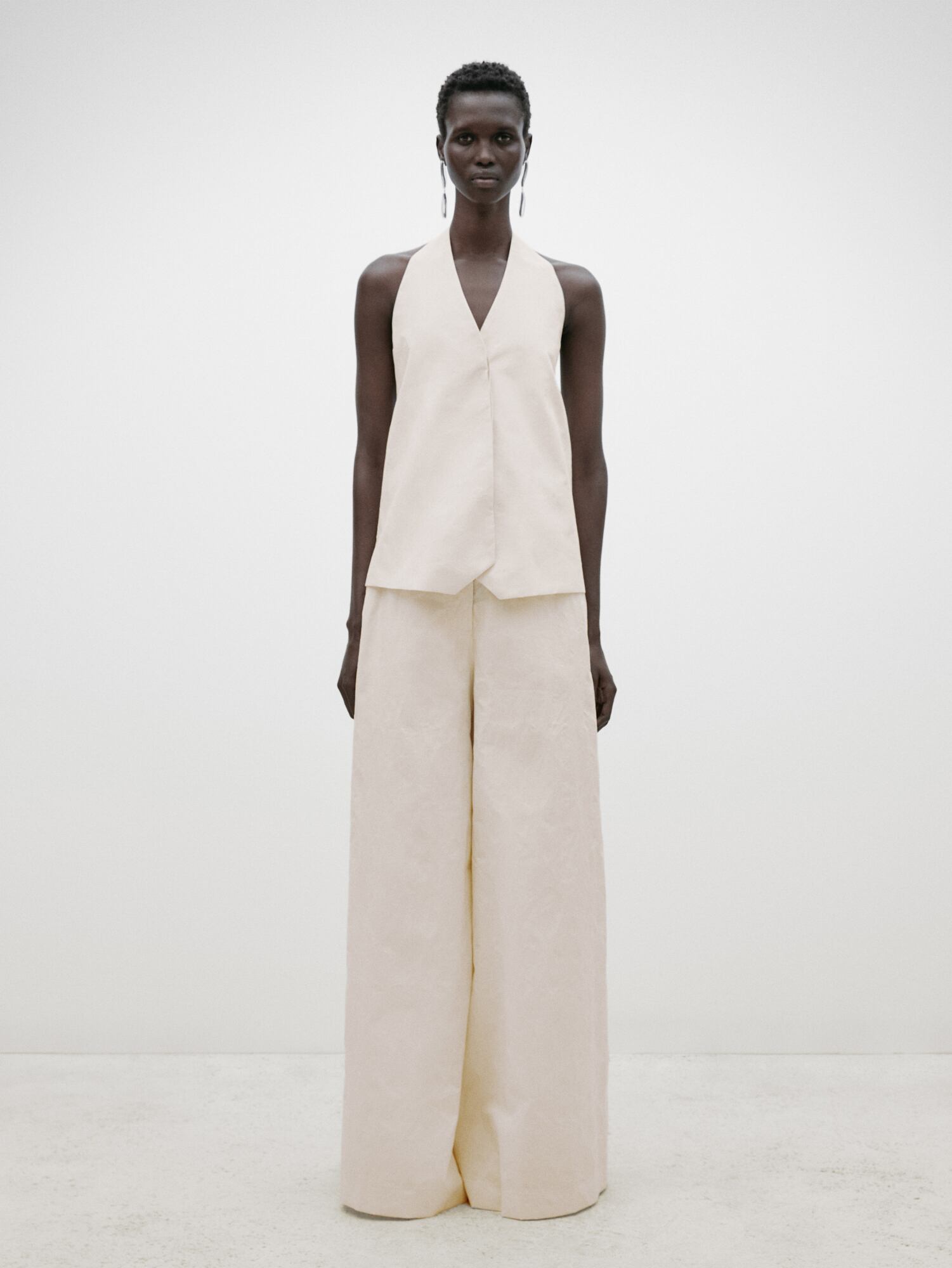 Creased-effect palazzo trousers - Limited Edition