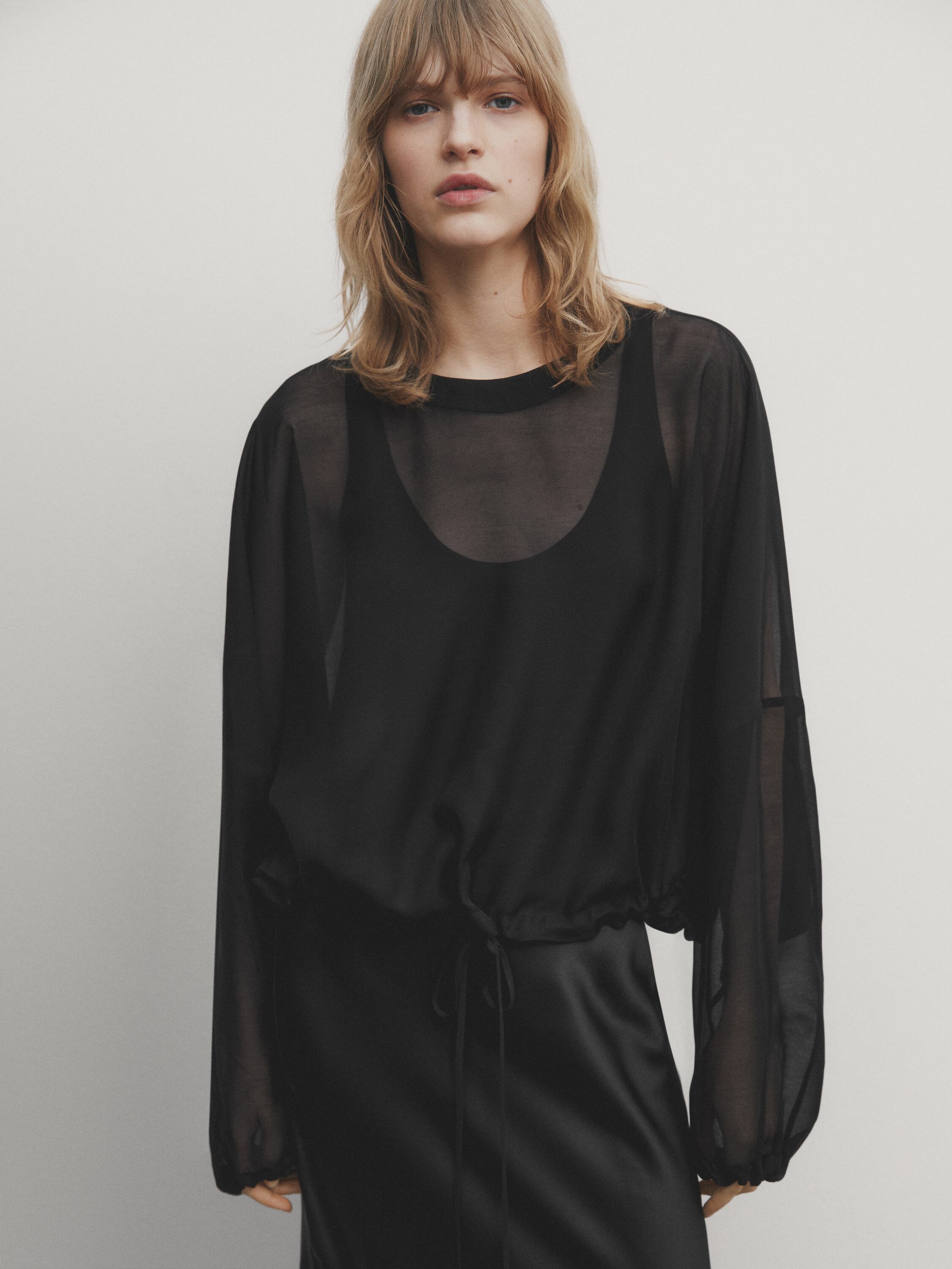Semi-sheer blouse with tie detail
