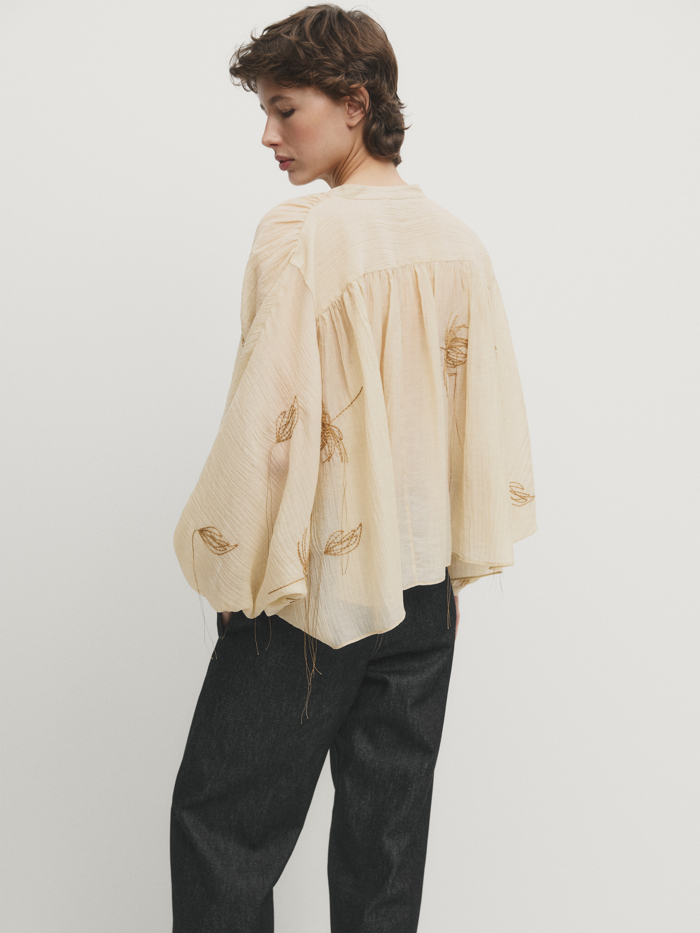Cape shirt with embroidered detail