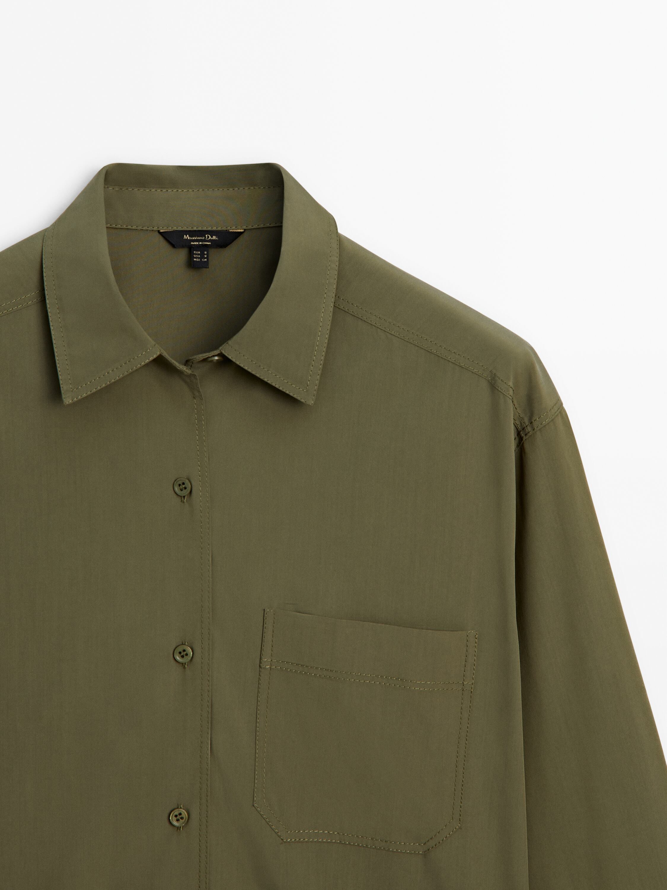 Flowing shirt with topstitching and chest pocket