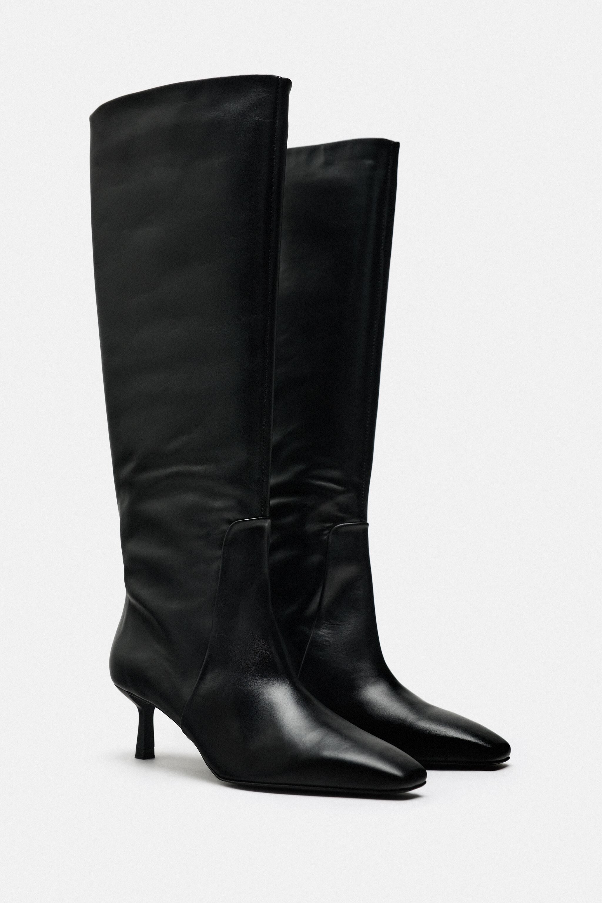 HEELED LEATHER KNEE HIGH BOOTS