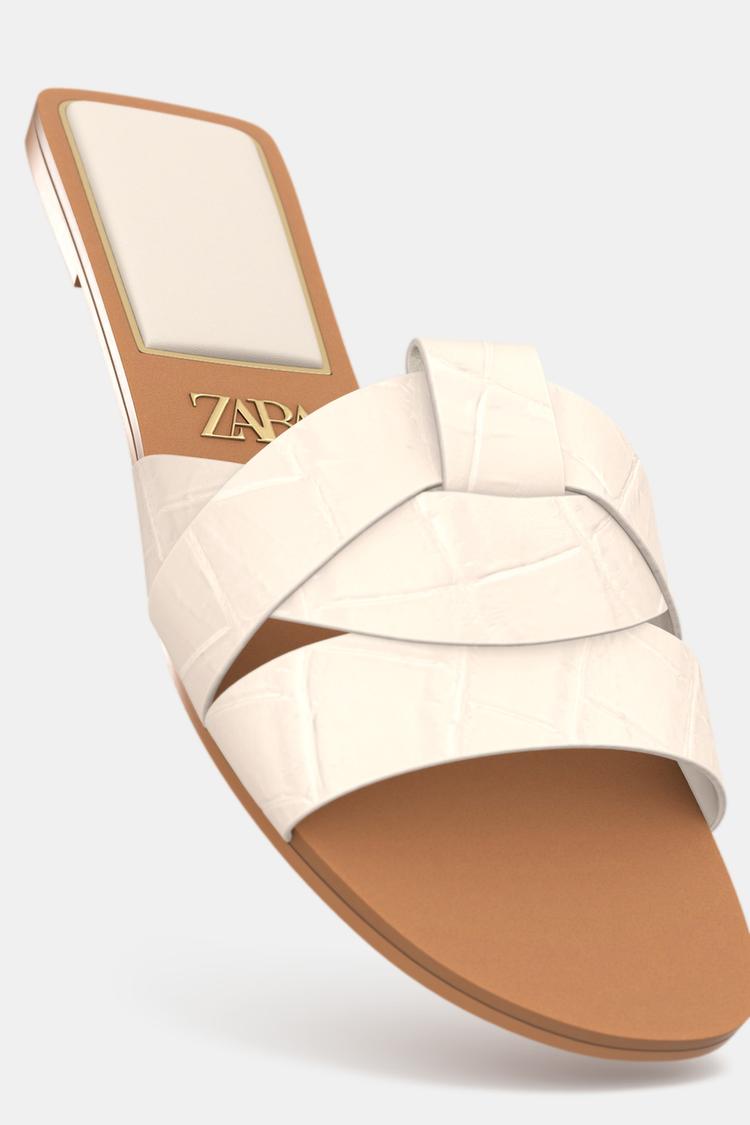 FLAT CROSSED-STRAP SANDALS