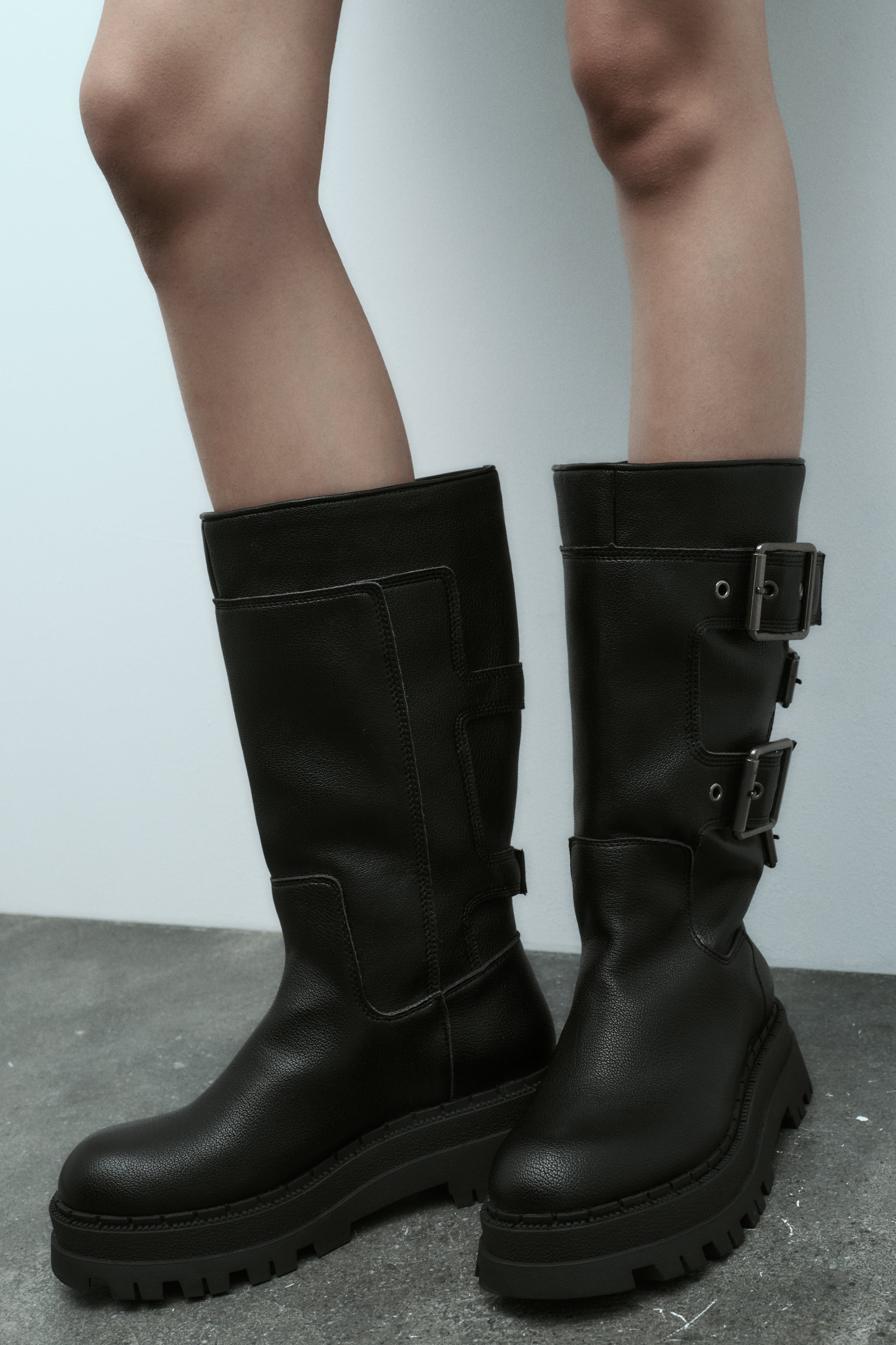 BUCKLED LUG SOLE ANKLE BOOTS