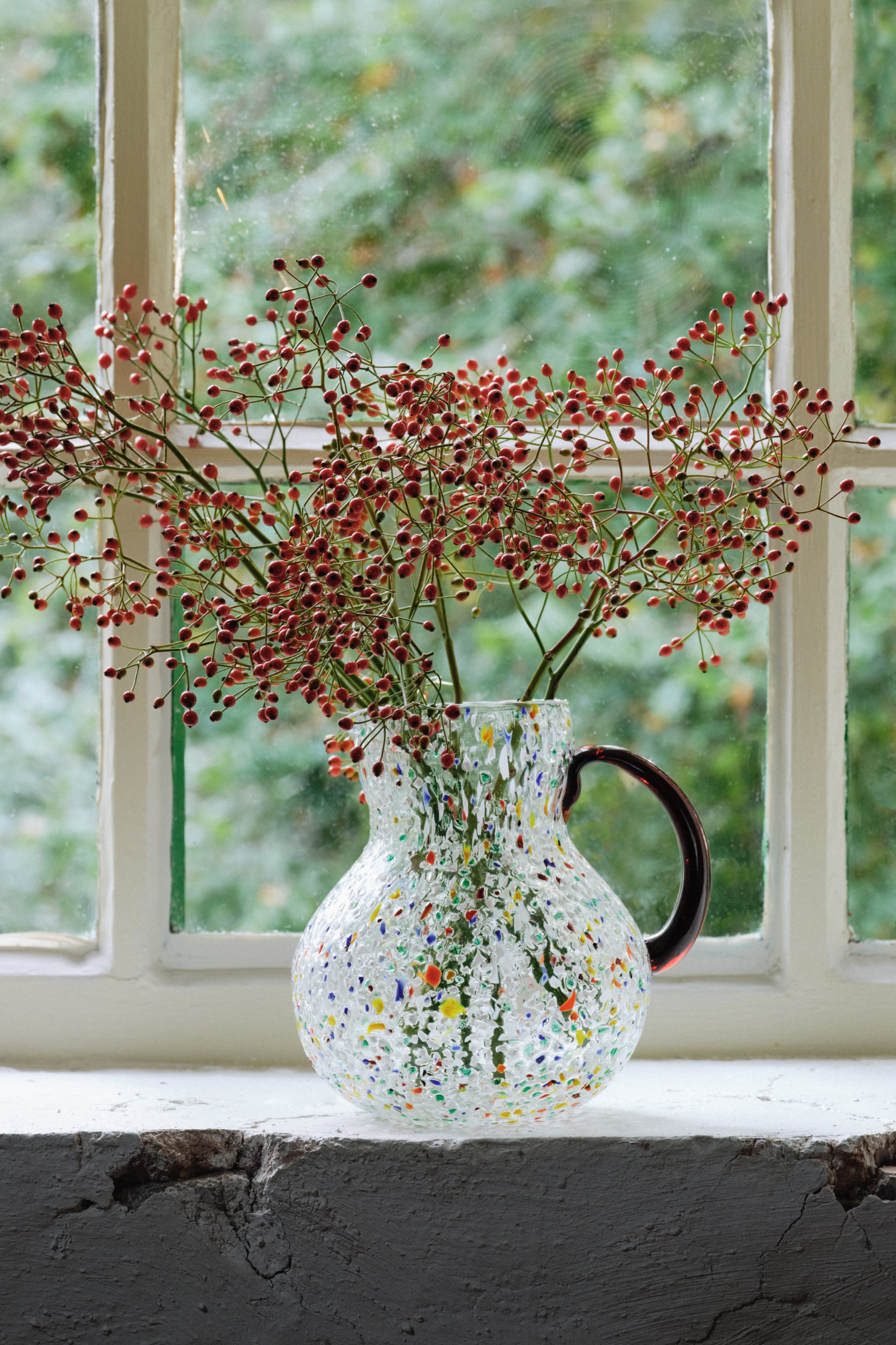 BLOWN GLASS JUG WITH SPECKLES