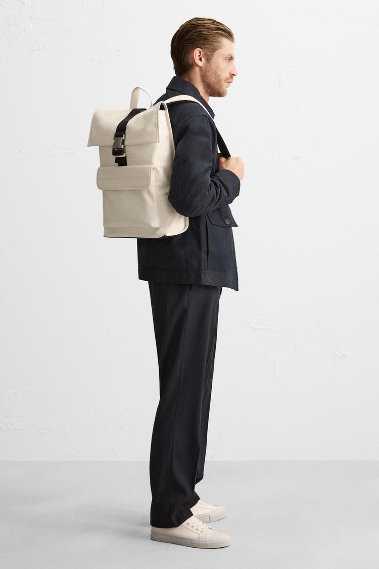 RUBBERIZED FLAP BACKPACK