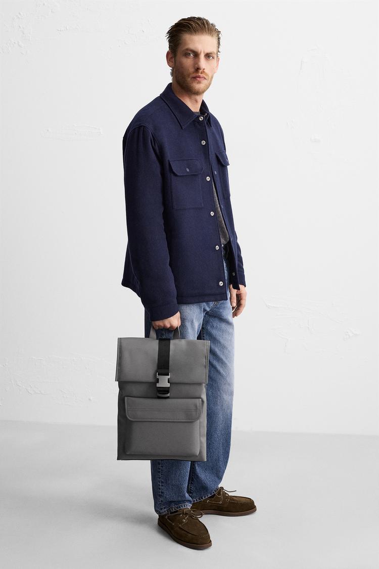 RUBBERIZED FLAP BACKPACK