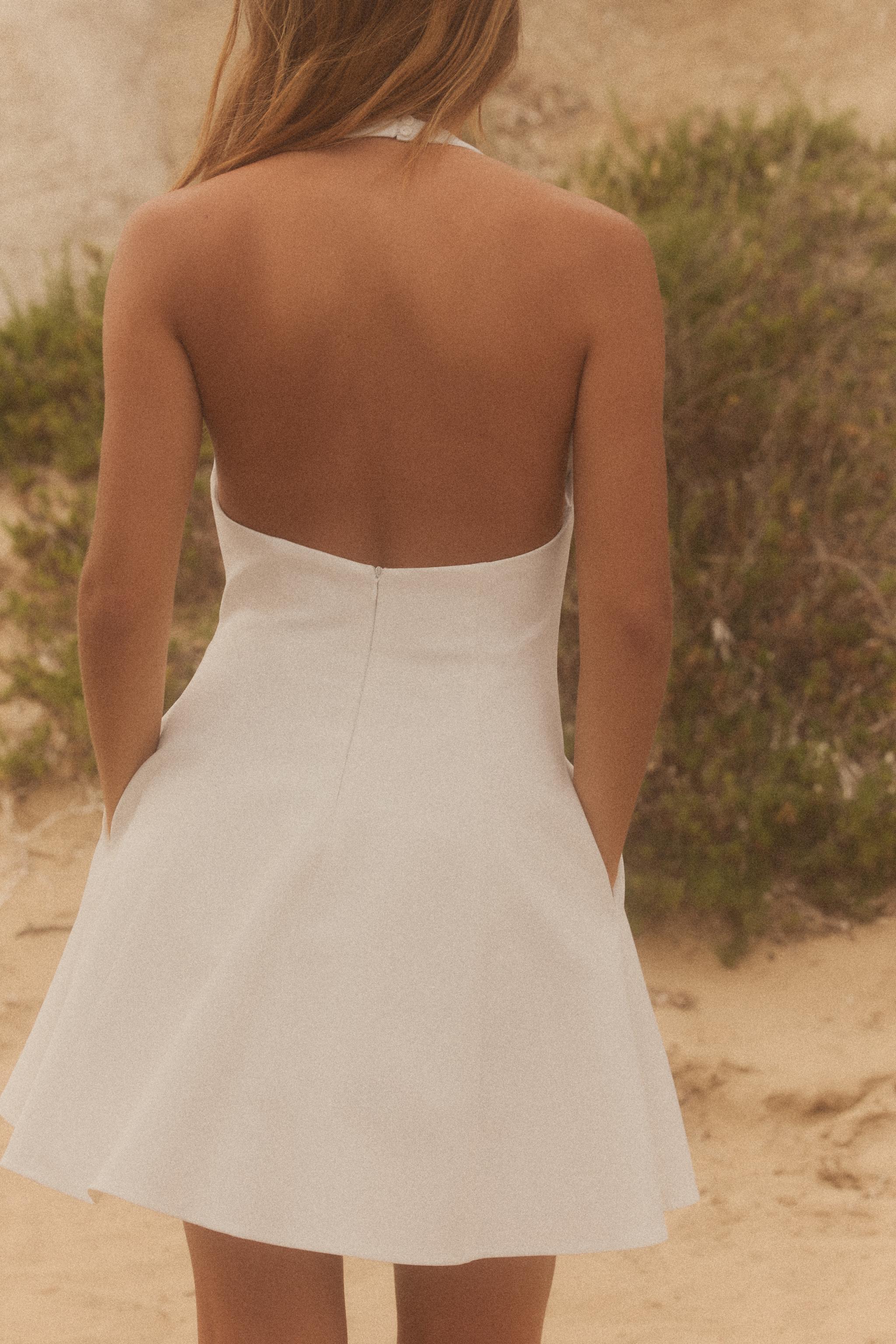 ROBE COURTE HALTER GODETS