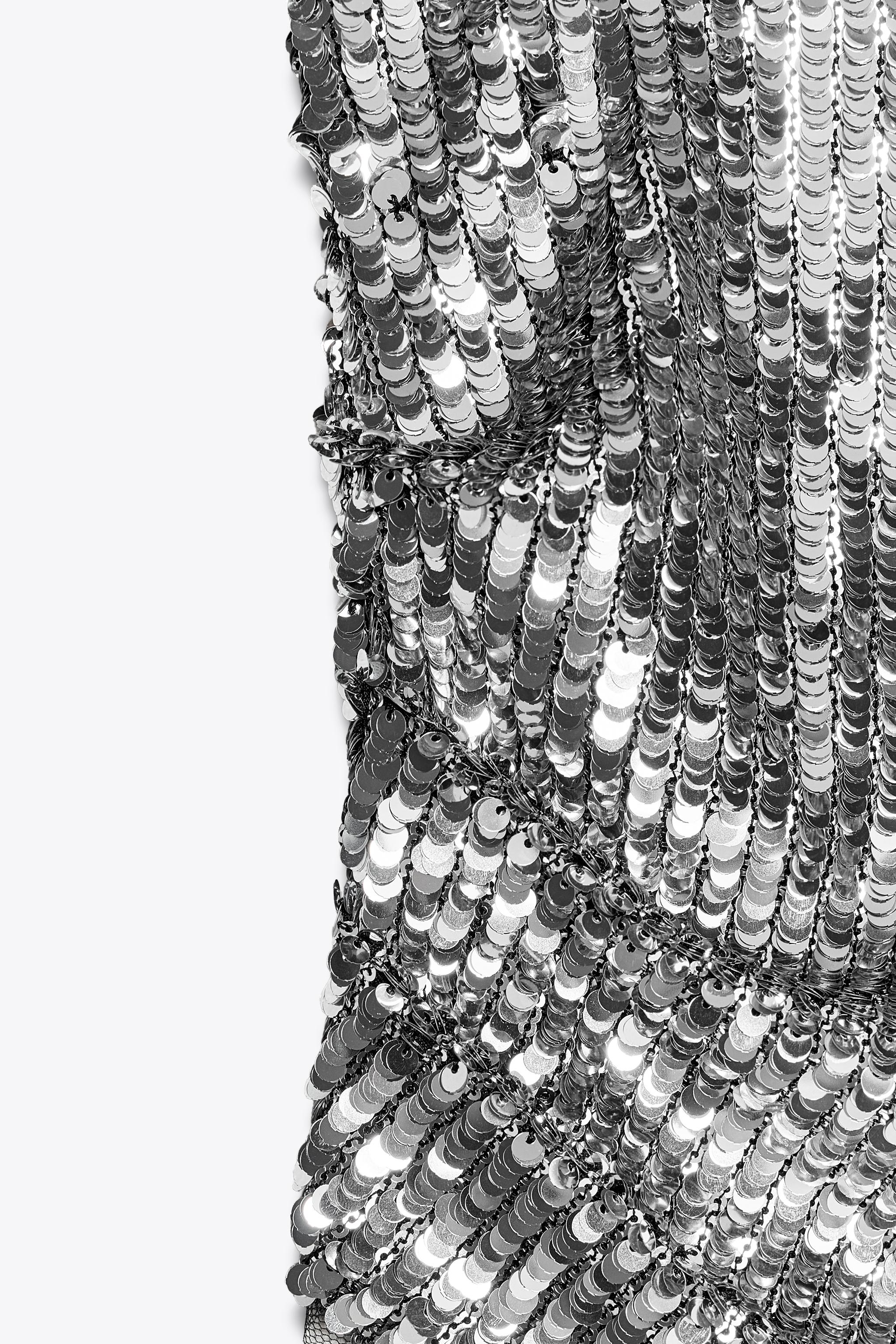 TOP ASYMÉTRIQUE À SEQUINS