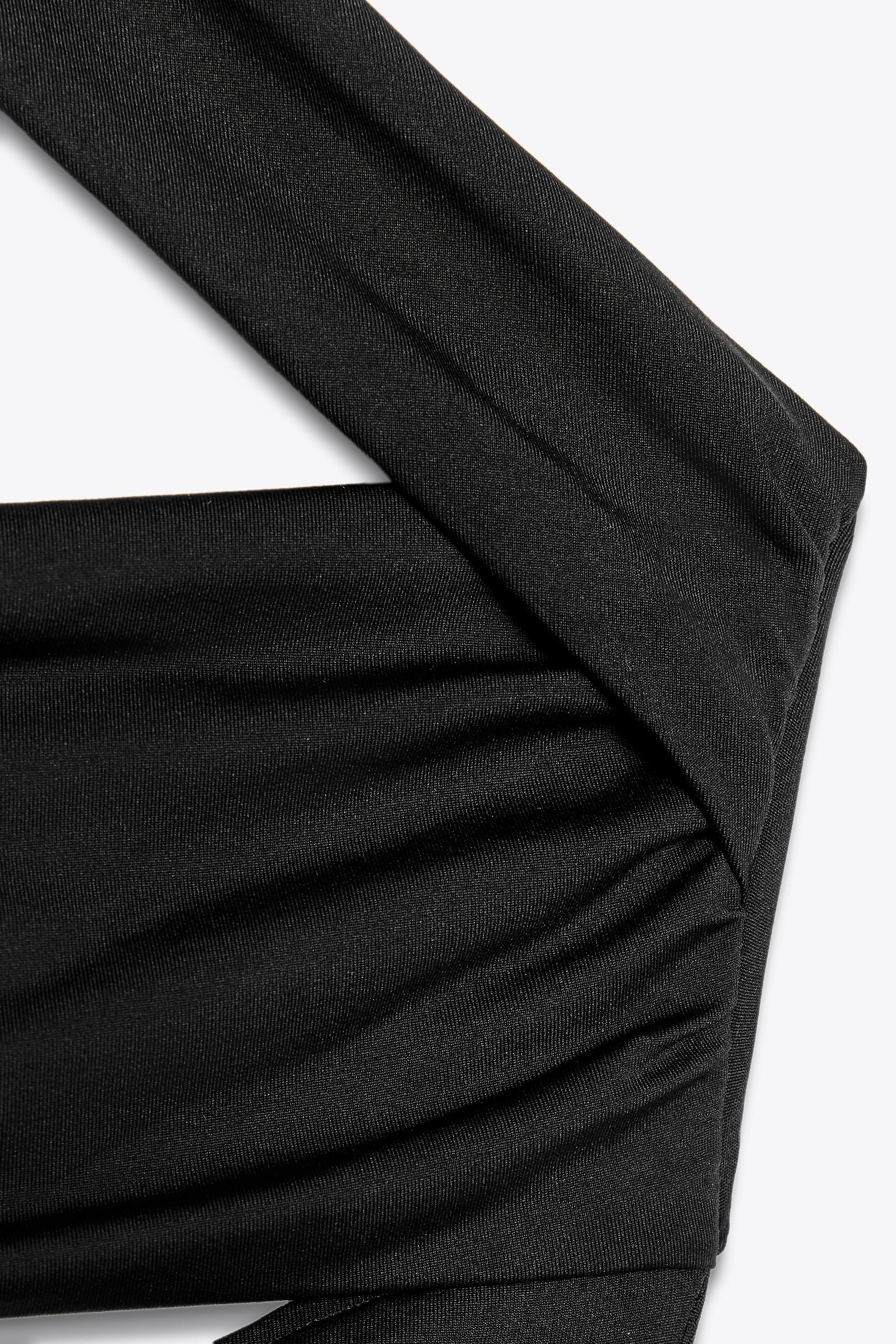 ASYMMETRIC CUT OUT POLYAMIDE BODYSUIT