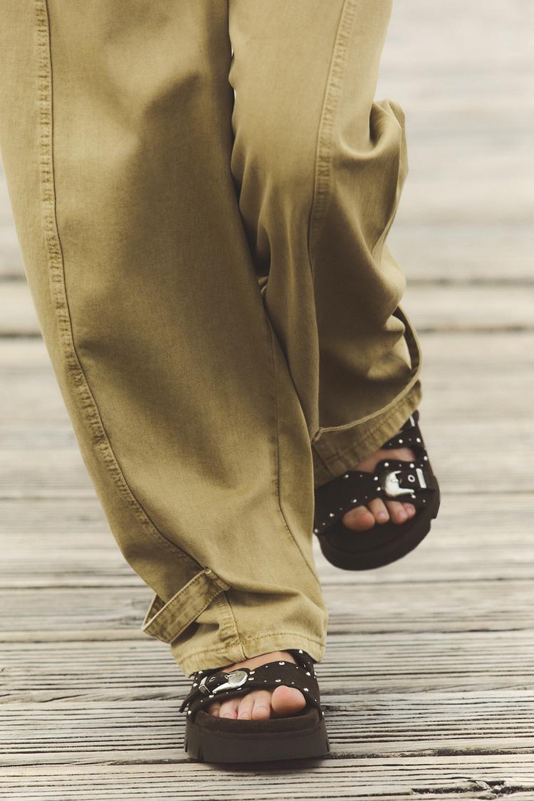 LEATHER FLAT STUDDED SANDALS