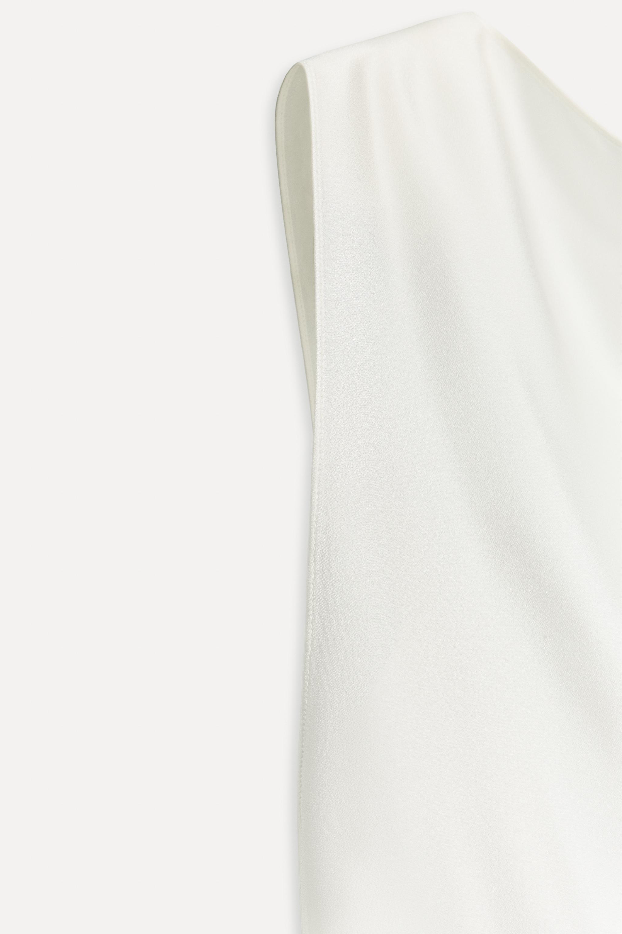 ASYMMETRIC TOP 50TH ANNIVERSARY