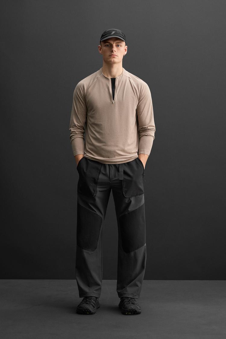 SEAMLESS ZIPPER NECK T-SHIRT