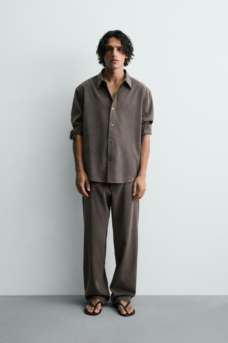 RELAXED FIT FLOWY PANTS - Zara product image