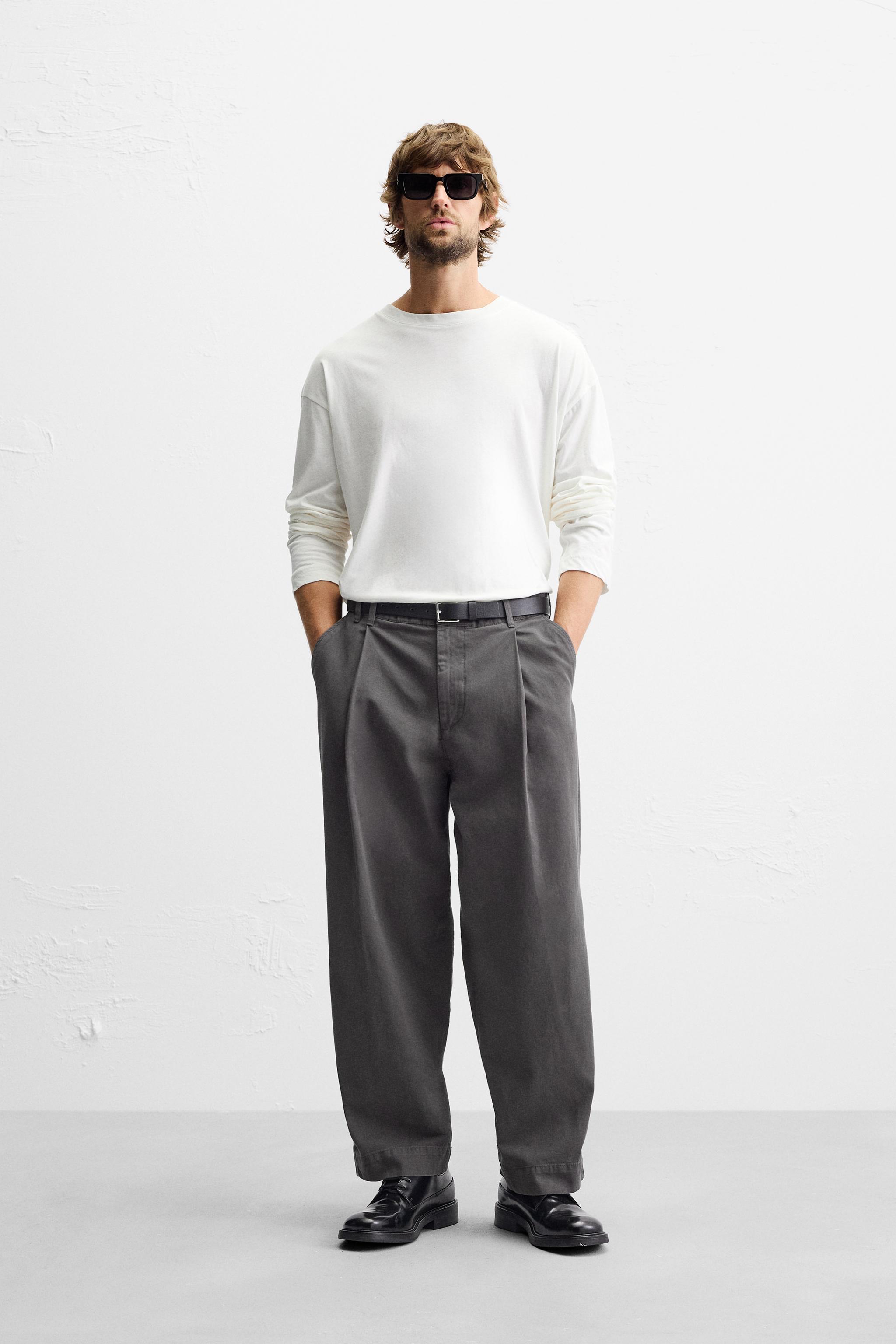 PLEATED CHINO PANTS