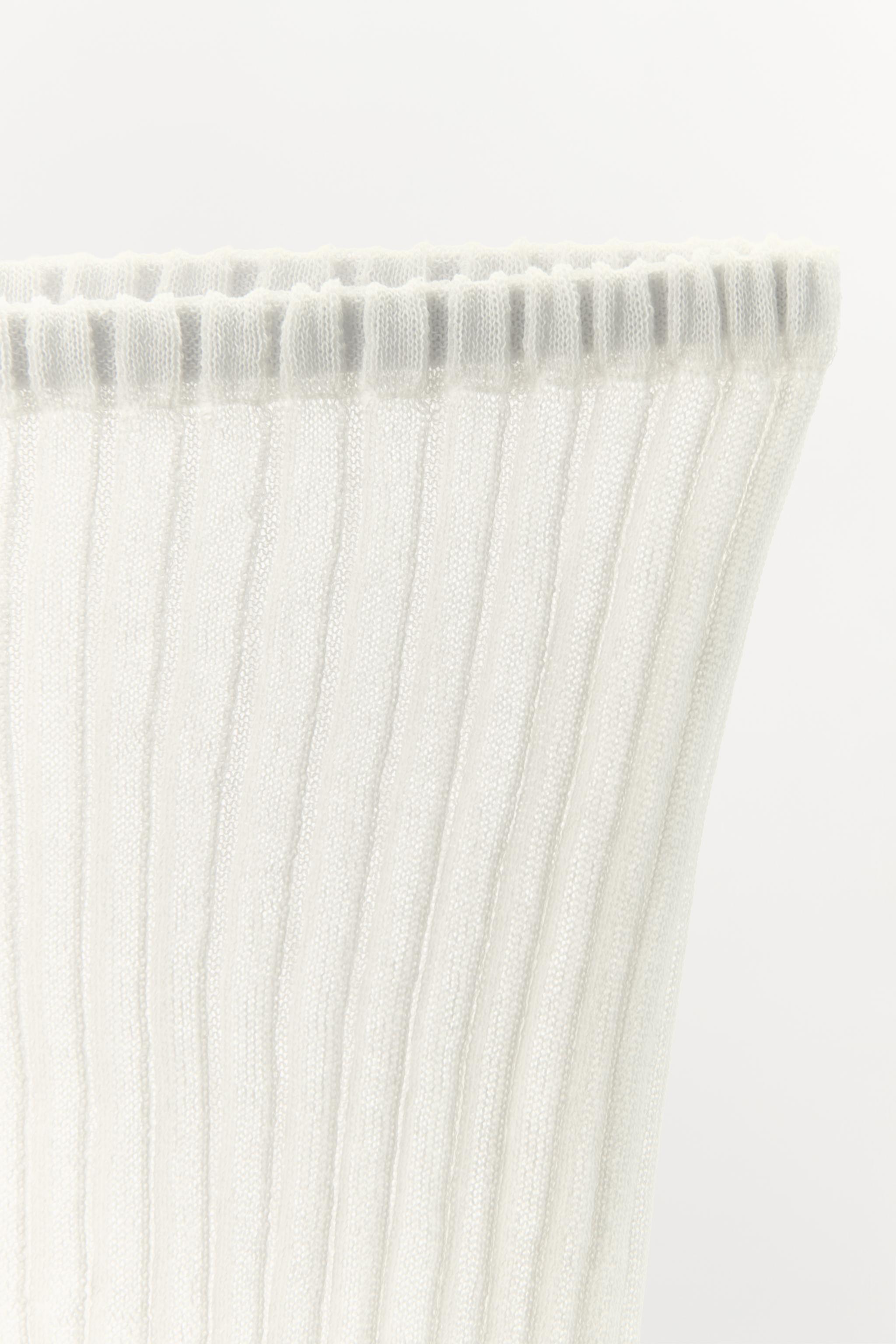 CULOTTE EN MAILLE FINE PLISSÉE