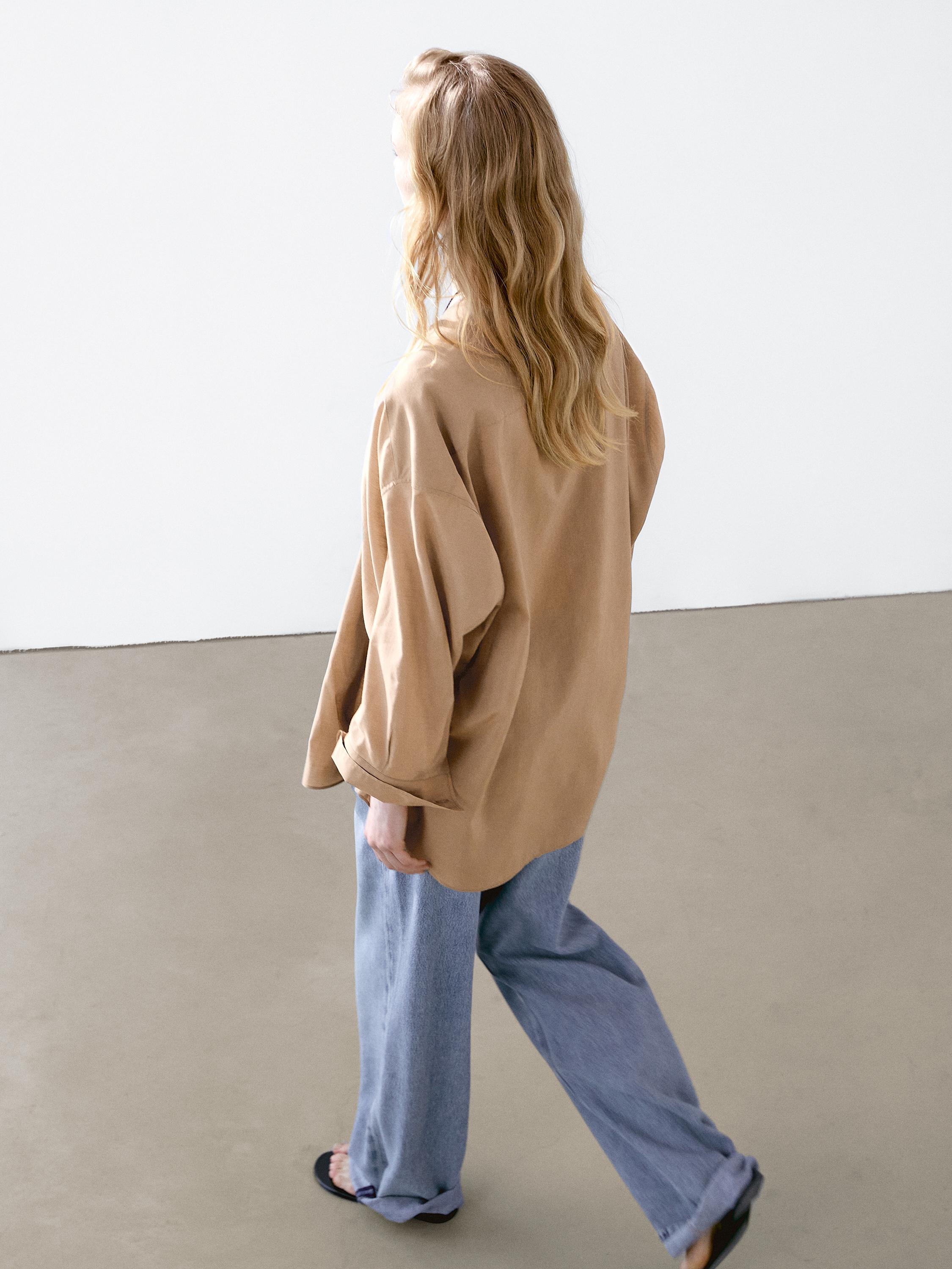 Flowing satin blouse