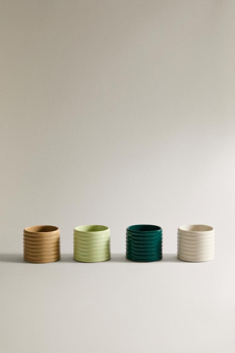 PACK OF CERAMIC NAPKIN HOLDERS WITH RELIEF (PACK OF 4) - Zara product image