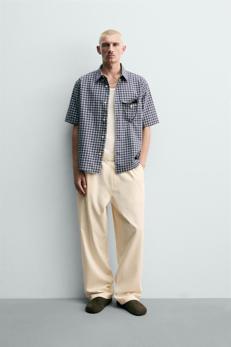 RELAXED FIT HERRINGBONE PANTS - Zara product image