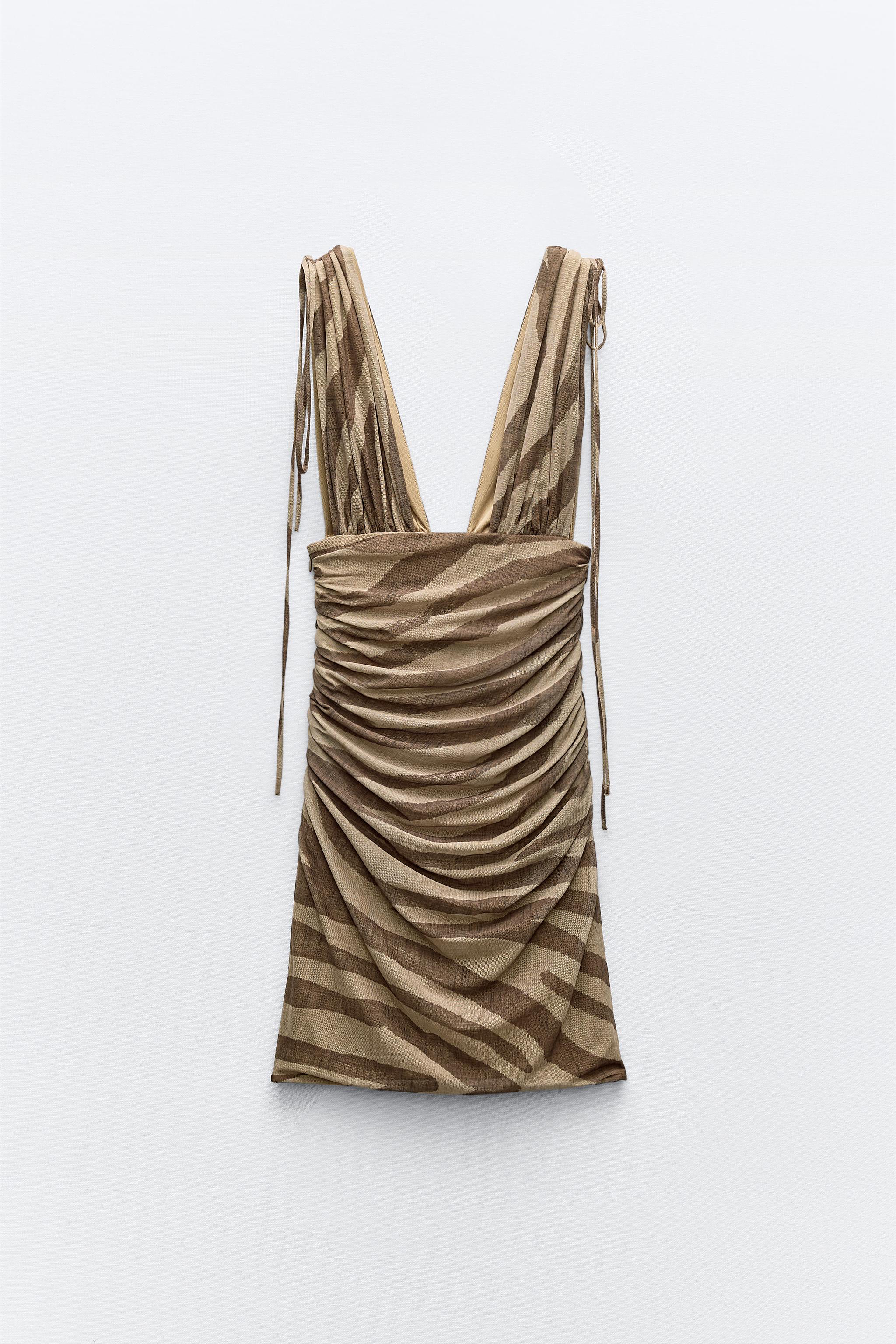 Compare DRAPED PRINTED TULLE DRESS | Mall of America Compare DRAPED PRINTED TULLE DRESS | Mall of America