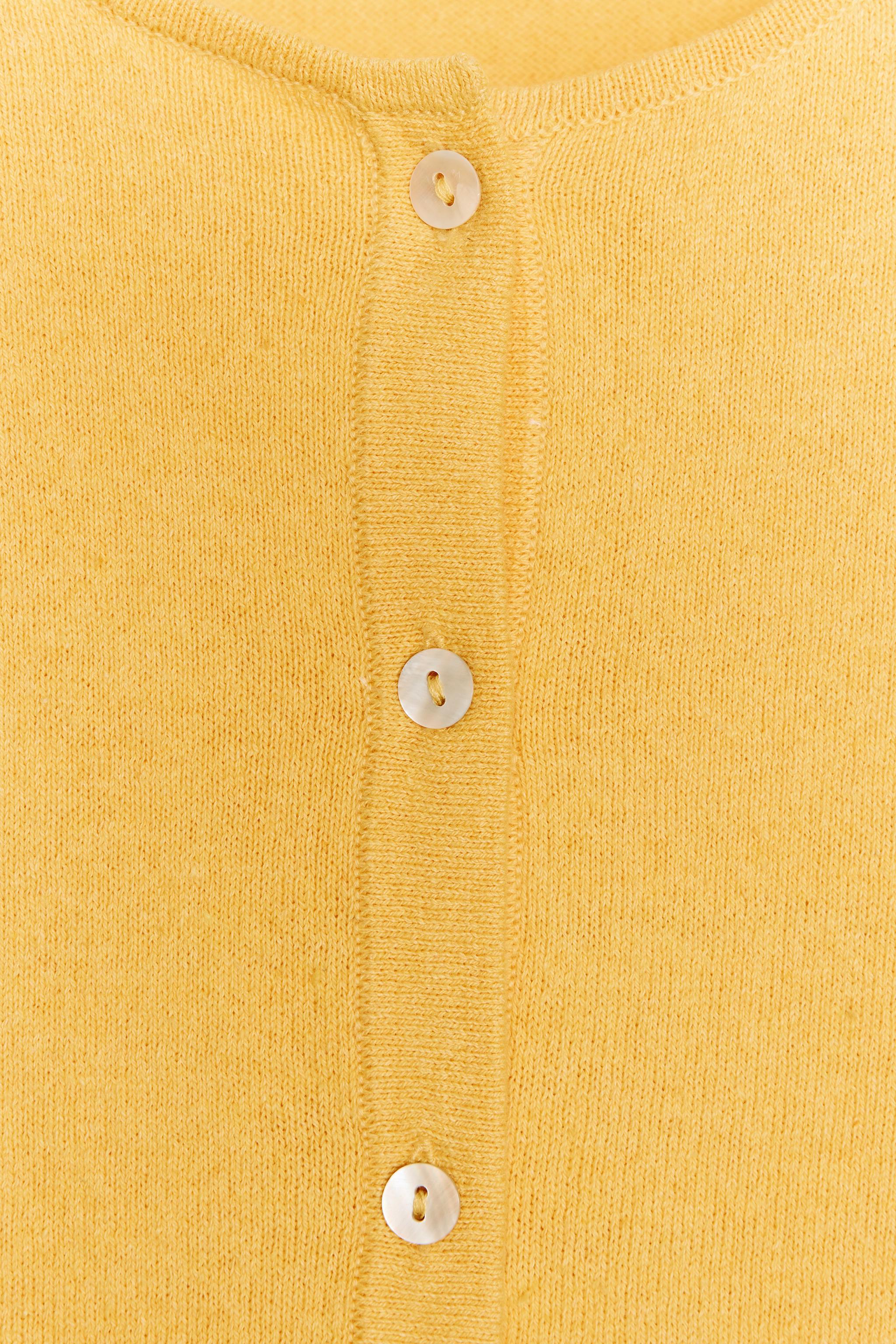 VESTE EN MAILLE UNIE