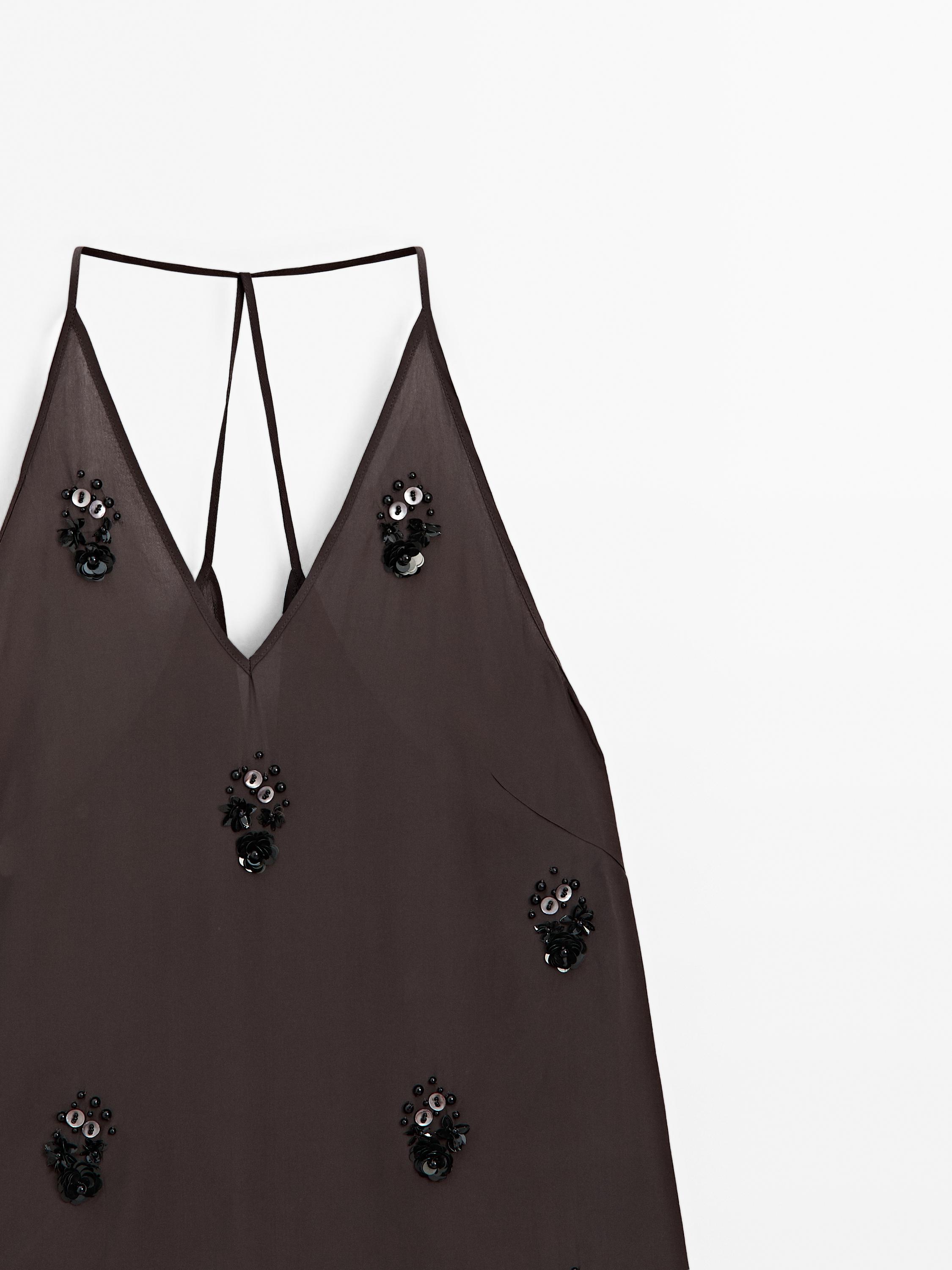 Top fluide à fleurs appliquées