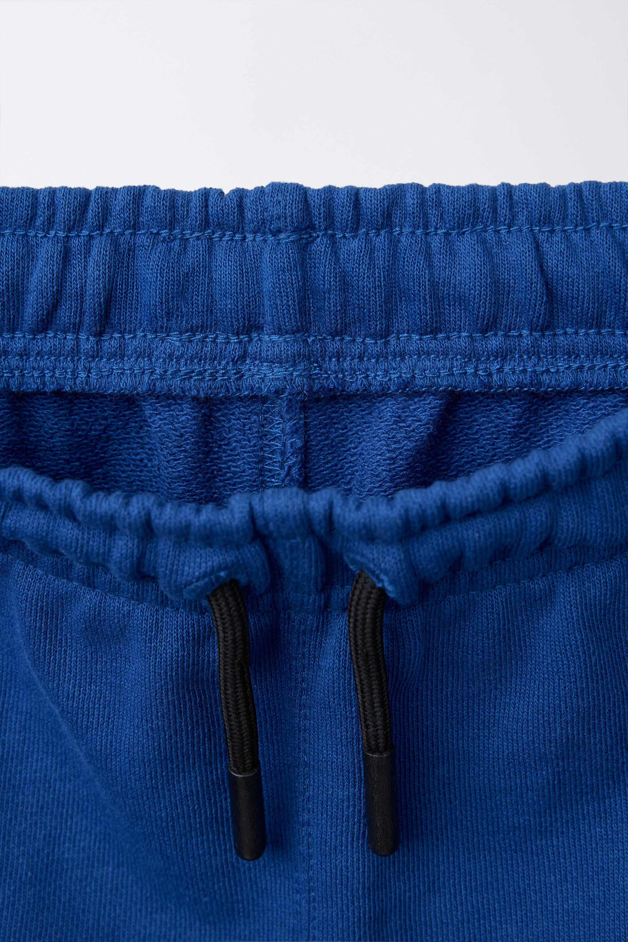 BERMUDA DE JOGGING ÉTIQUETTE