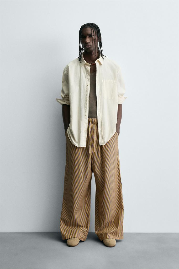 STRIPED OVERSIZED FIT PANTS