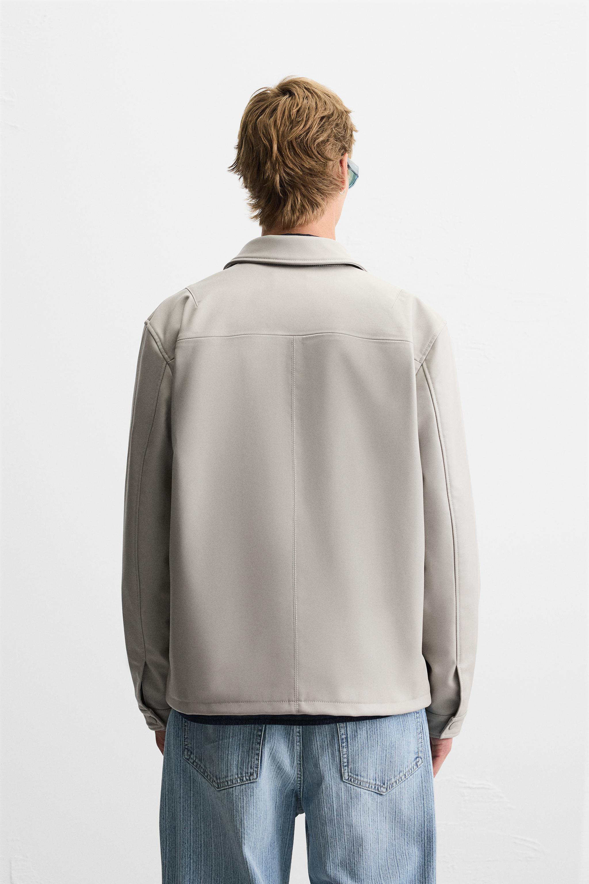 BLOUSON EN MATIÈRE SYNTHÉTIQUE