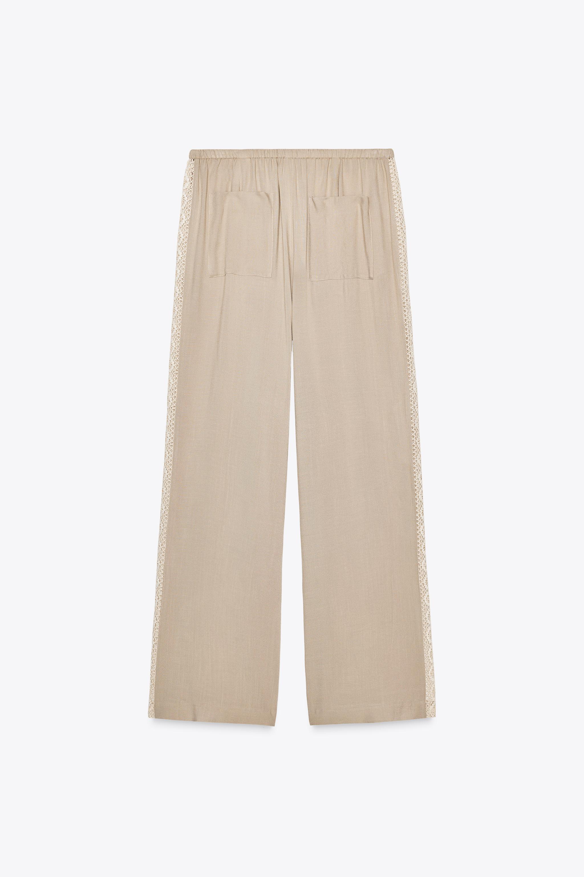 WIDE LEG PANTS WITH EMBROIDERED SIDE STRIPES