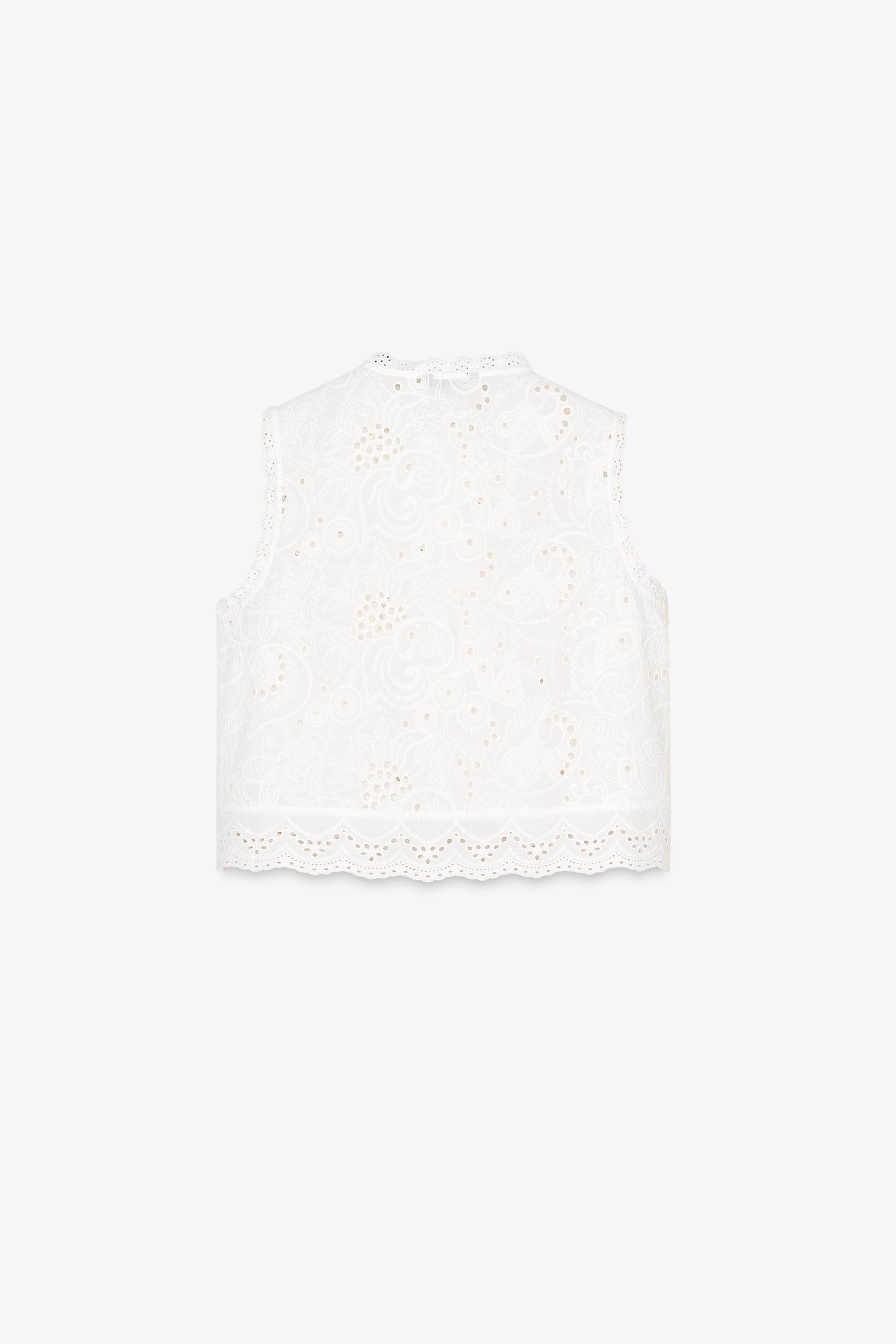 EMBROIDERED EYELET TOP