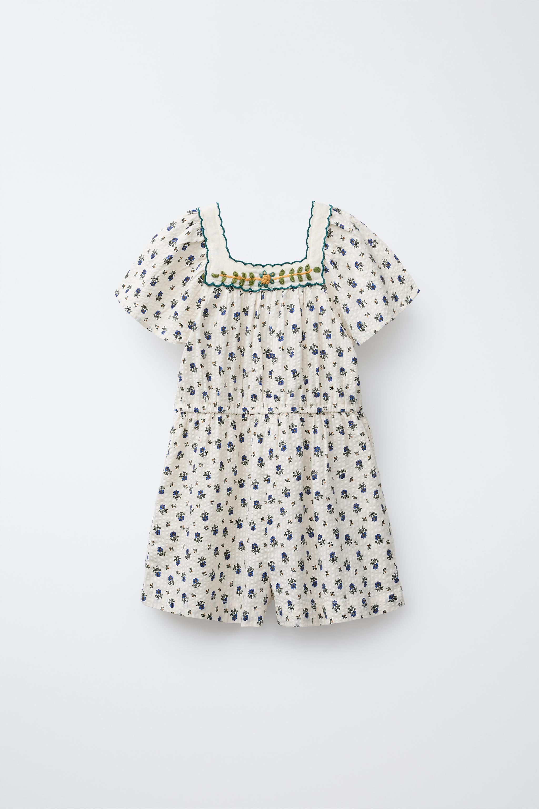 TEXTURED FLORAL SHORT JUMPSUIT