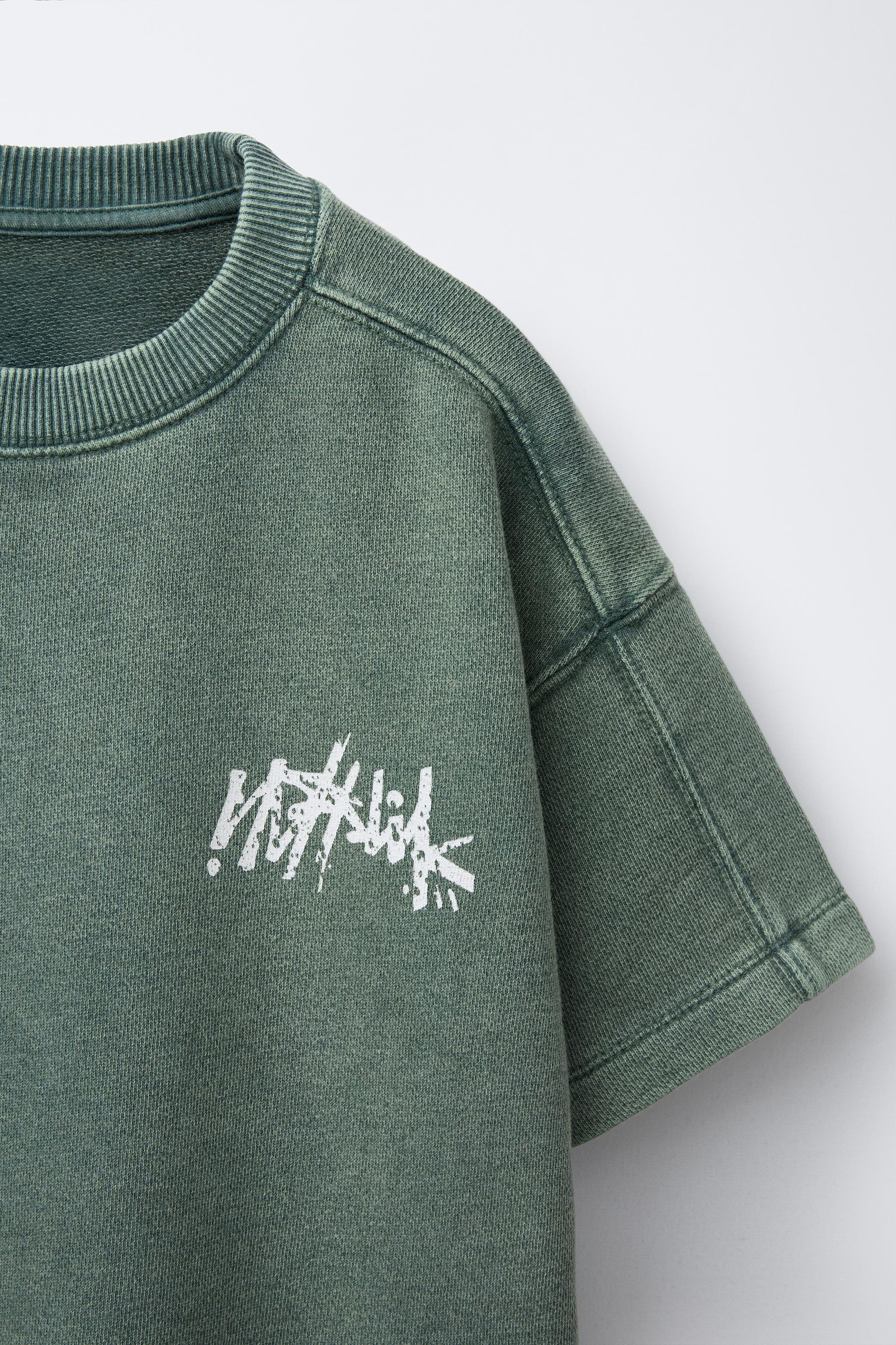 T-SHIRT EFFET DÉLAVÉ GRAFFITI