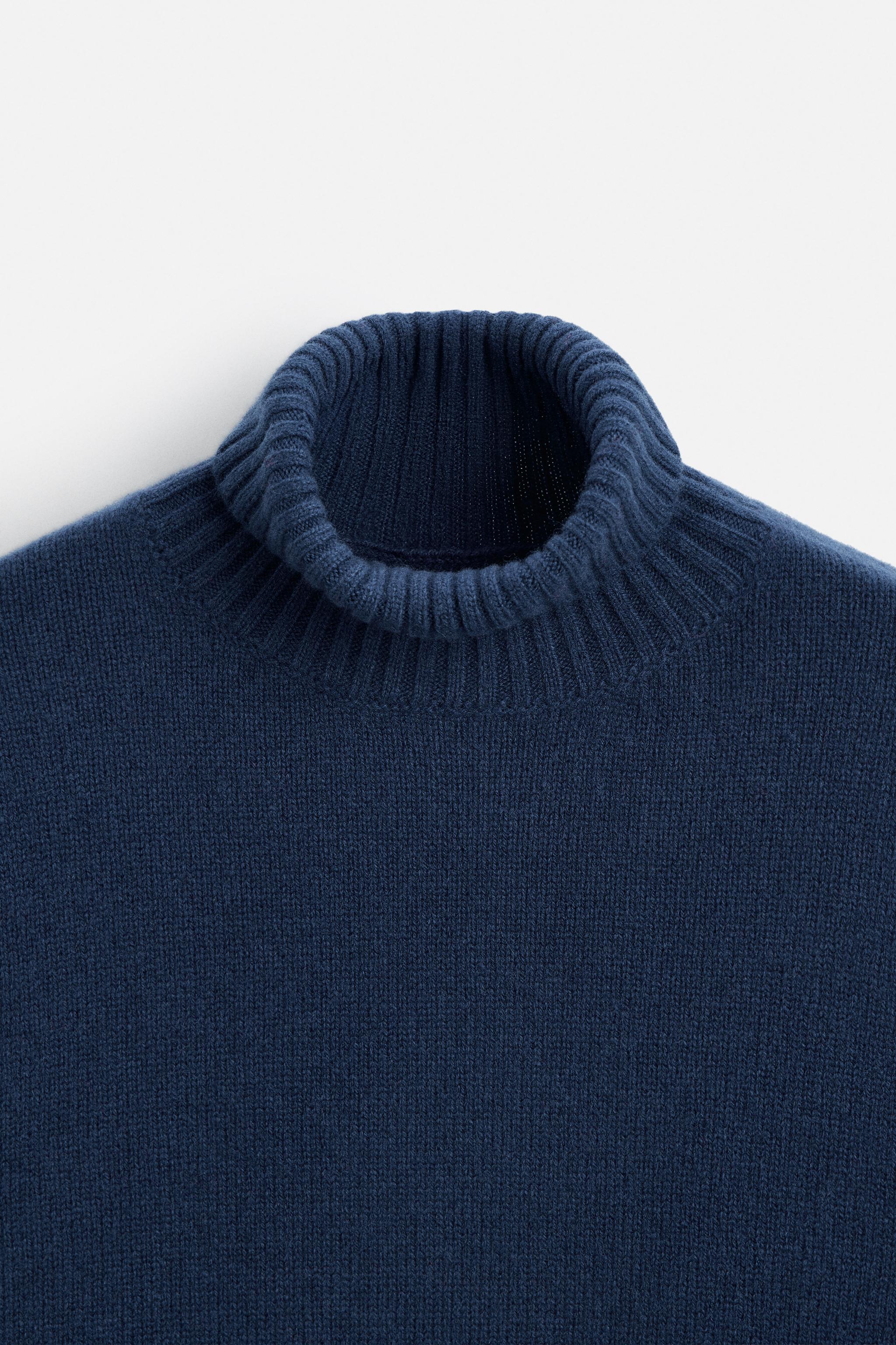 100% WOOL SWEATER