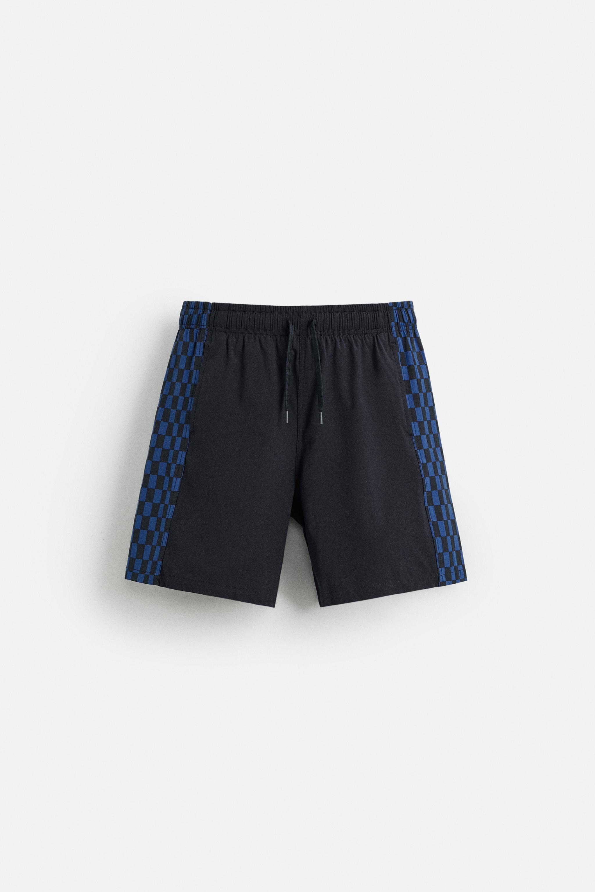 MAILLOT DE BAIN LONG À BANDES CARREAUX