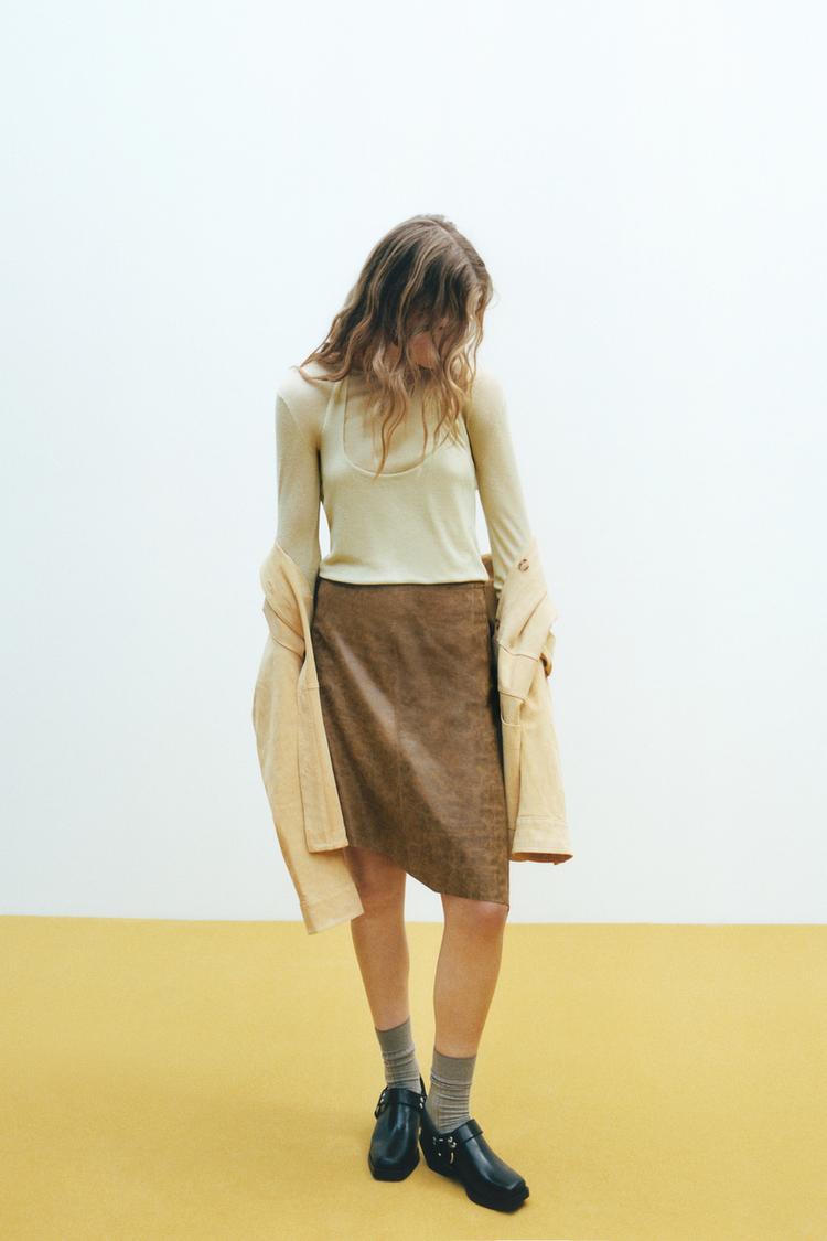 ASYMMETRIC LEATHER MIDI SKIRT