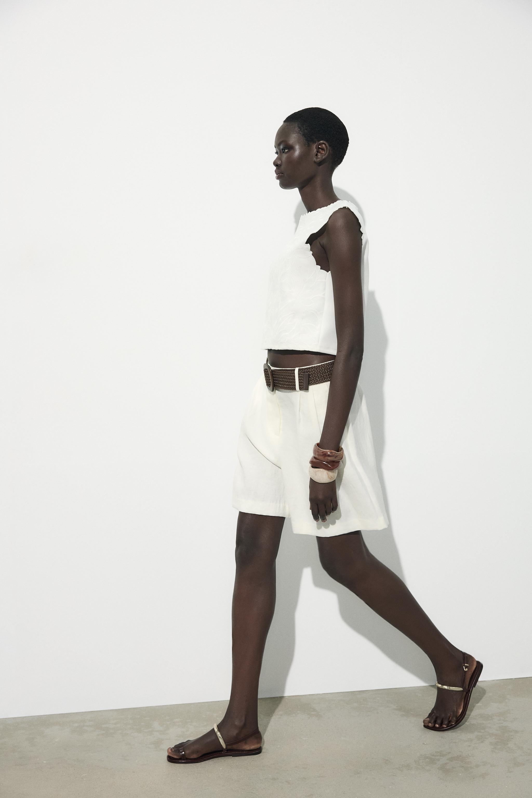EMBROIDERED INTERLOCK TOP