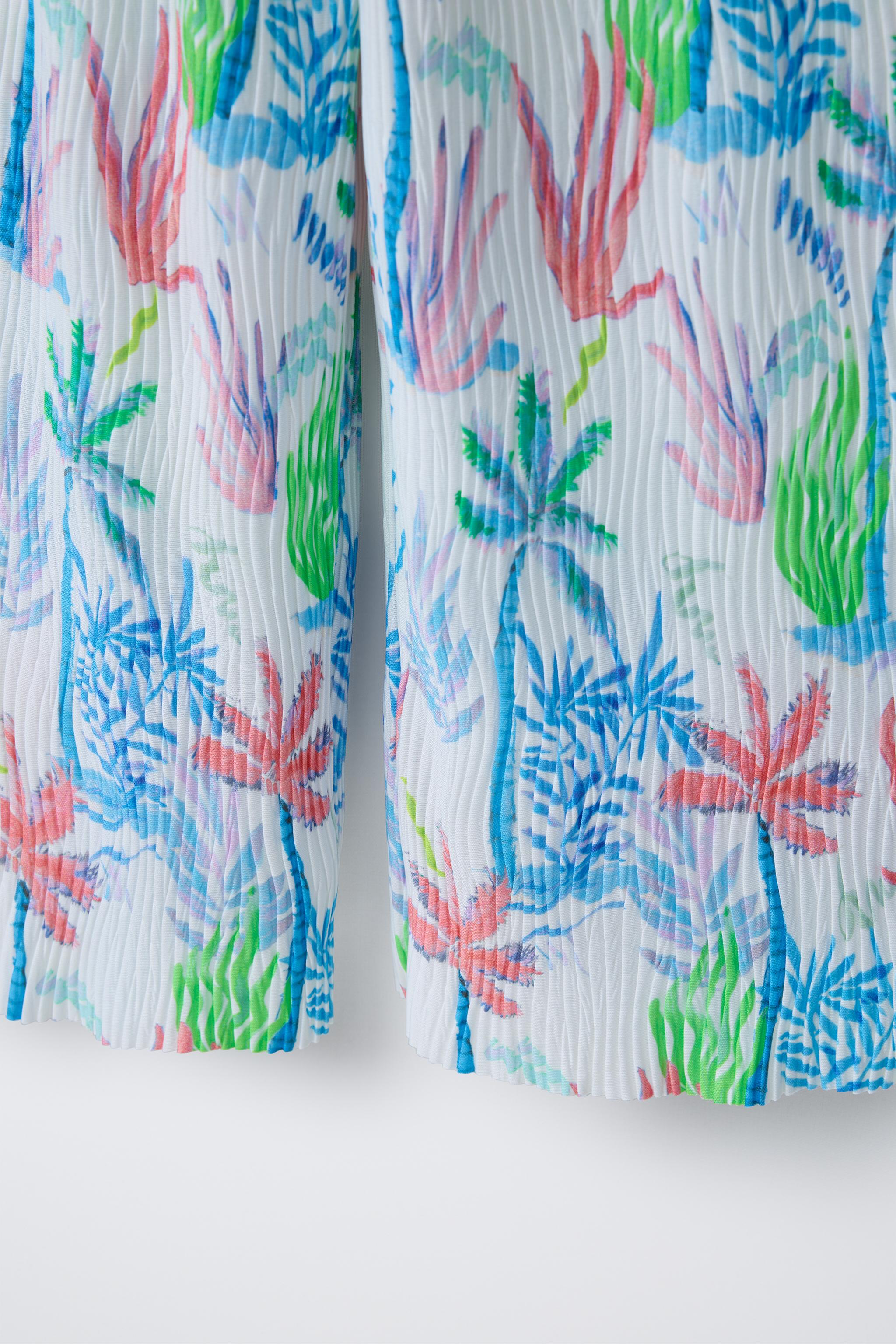 PLEATED PRINTED JUMPSUIT