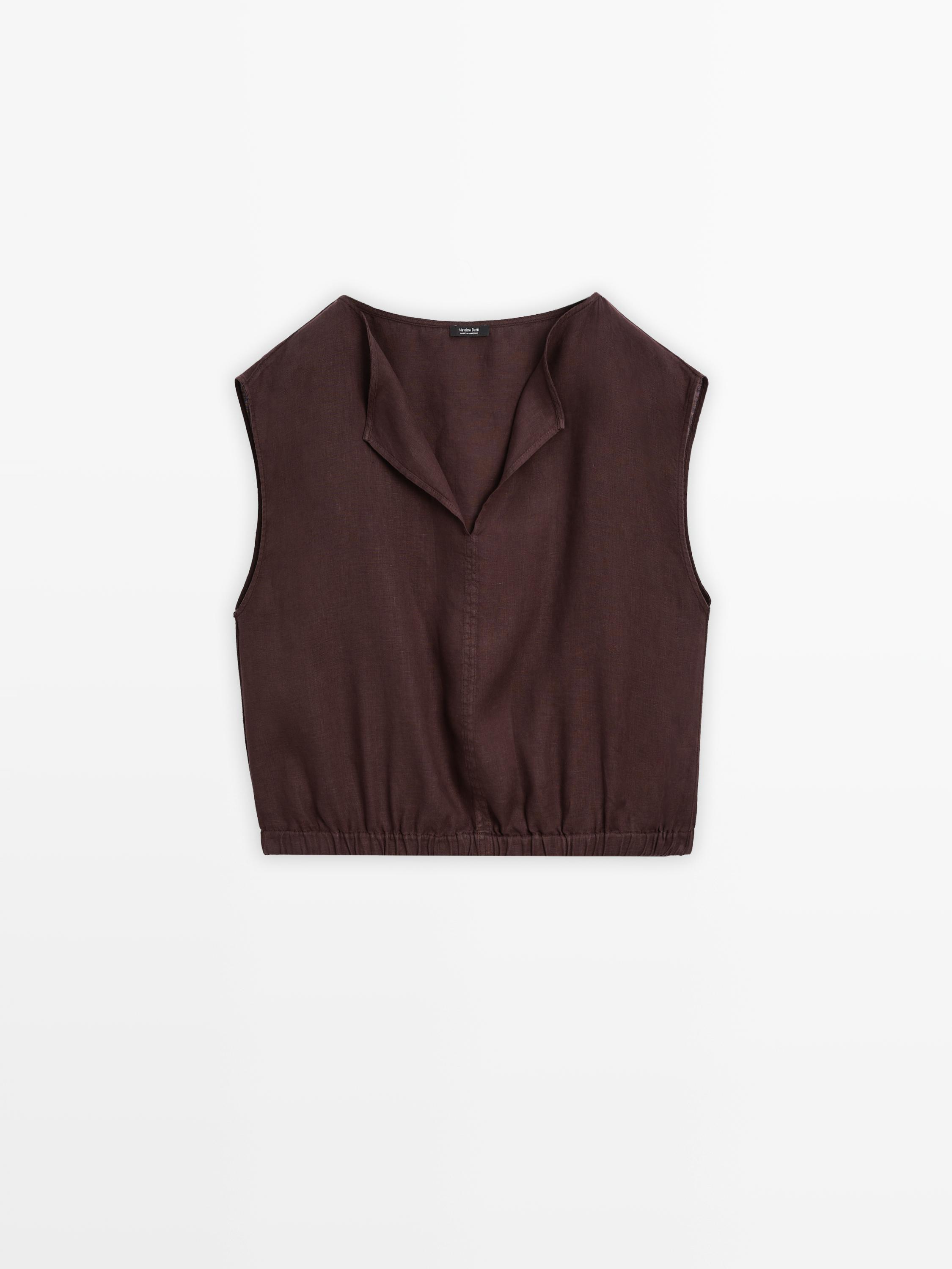 Linen blouse with elasticated hem