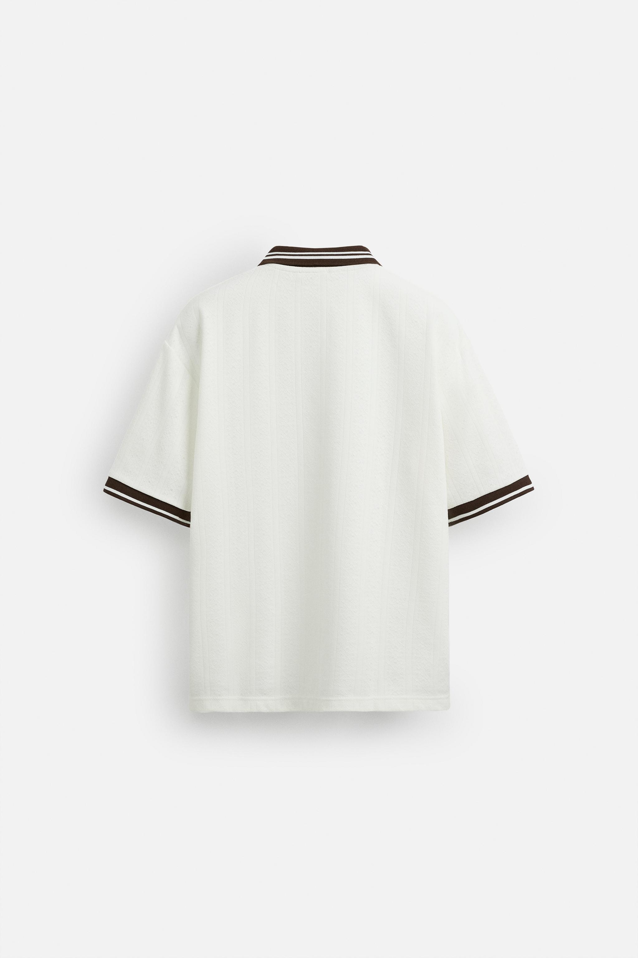 POLO JACQUARD INSCRIPTION BRODÉE