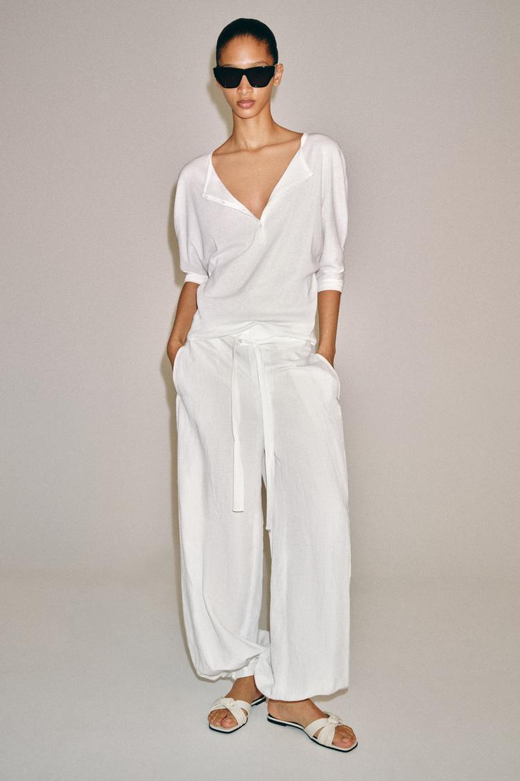 LEATHER BOW FLAT SANDALS - Zara product image