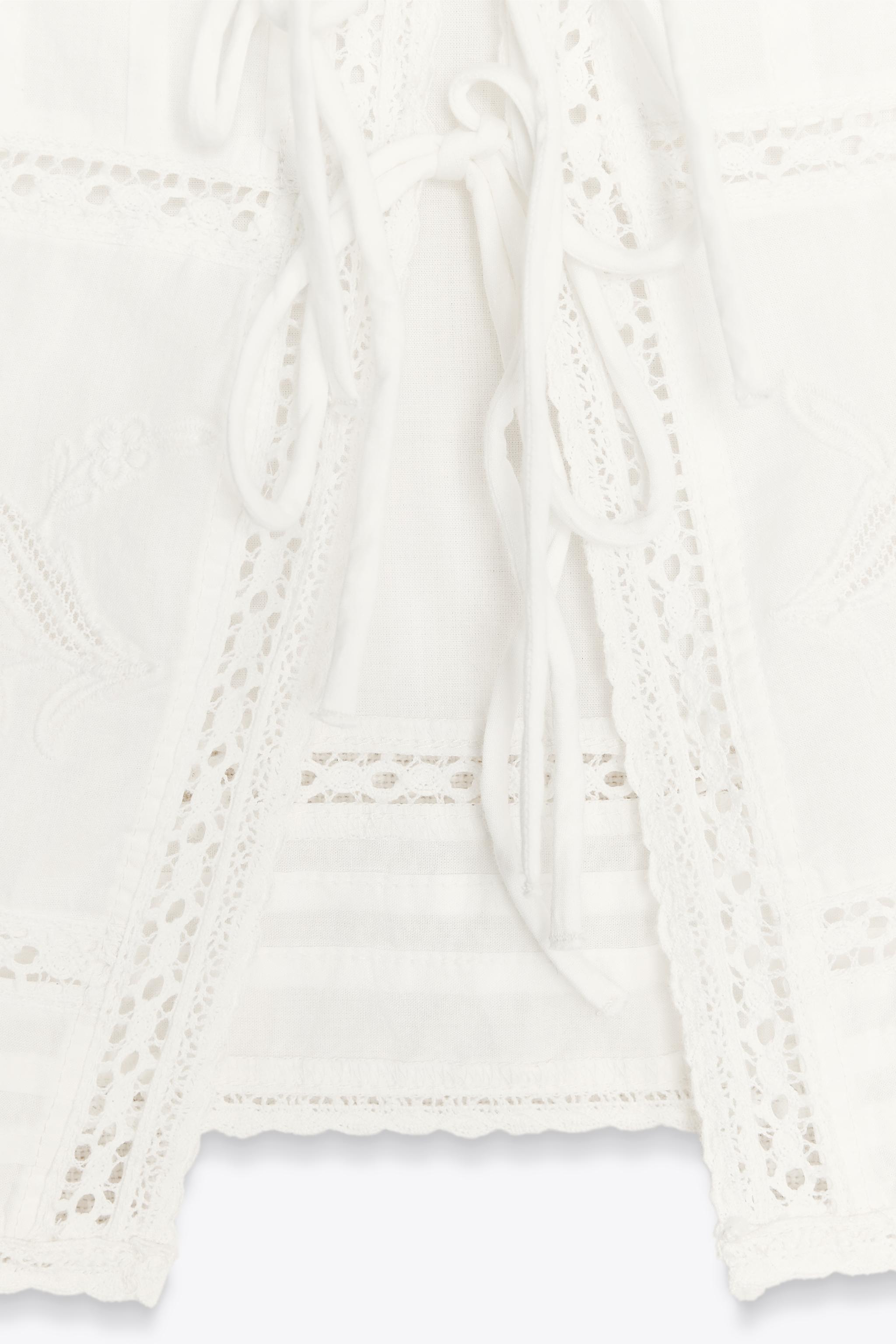 EMBROIDERED TIE TOP