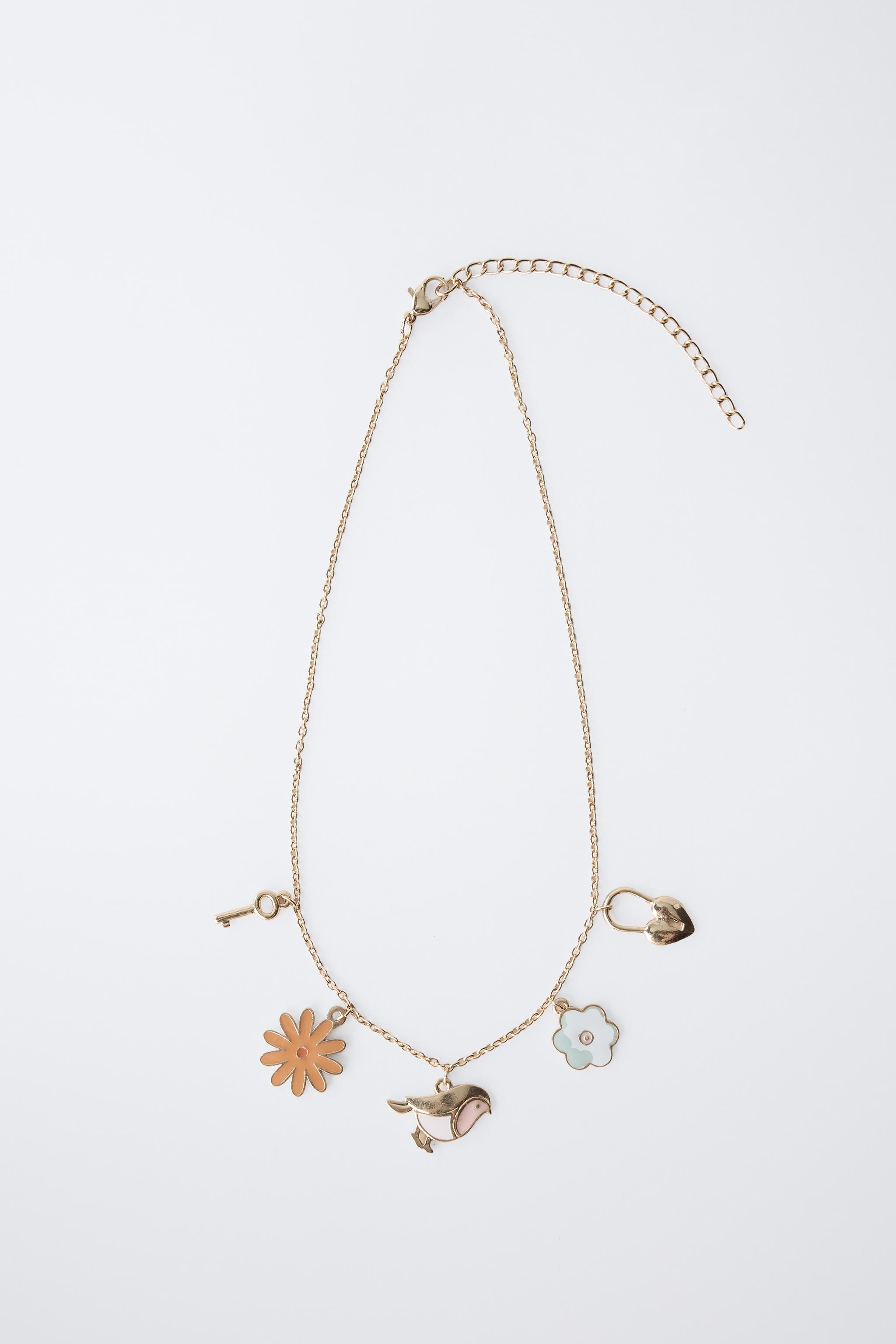 NECKLACE WITH VARIOUS PENDANTS